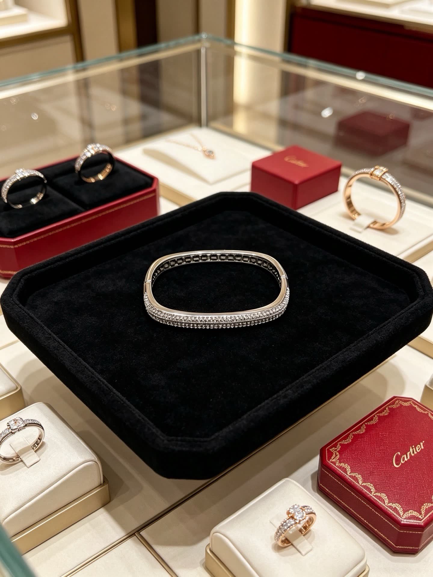 Cartier Elegant Silver Bangle Bracelet with Pave Setting