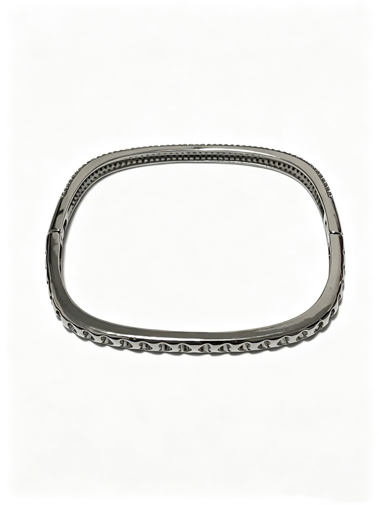 Cartier Elegant Silver Bangle Bracelet with Pave Setting
