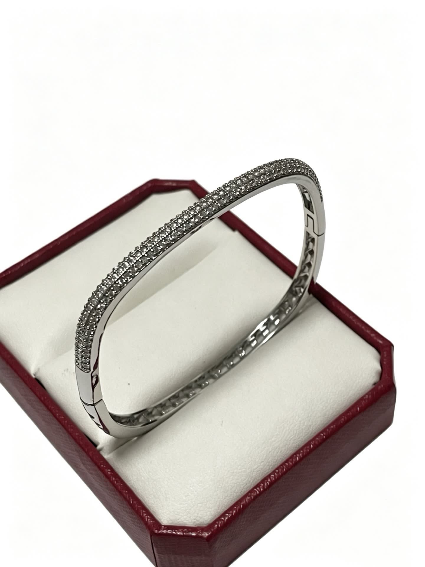 Cartier Elegant Silver Bangle Bracelet with Pave Setting