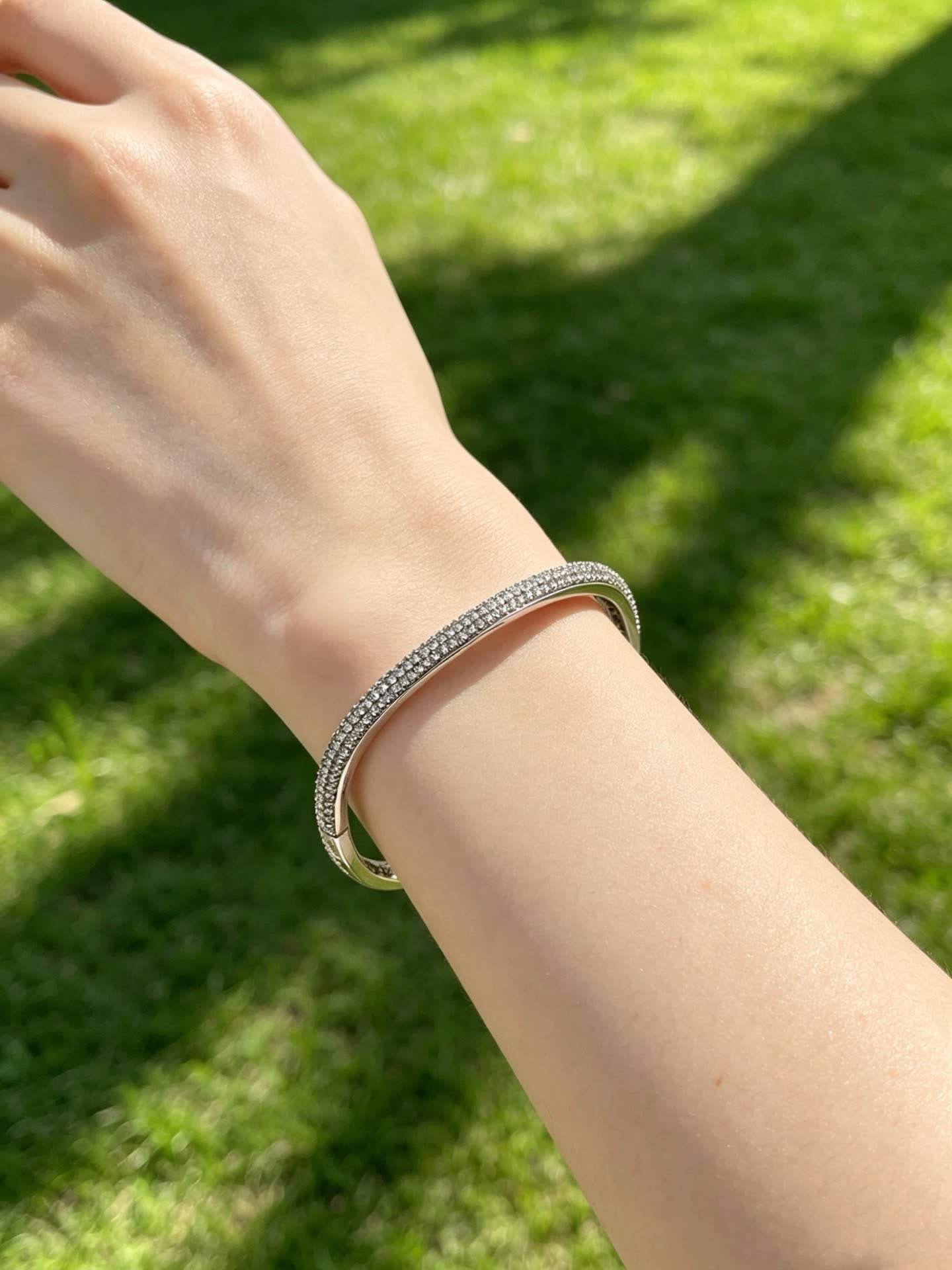 Cartier Elegant Silver Bangle Bracelet with Pave Setting