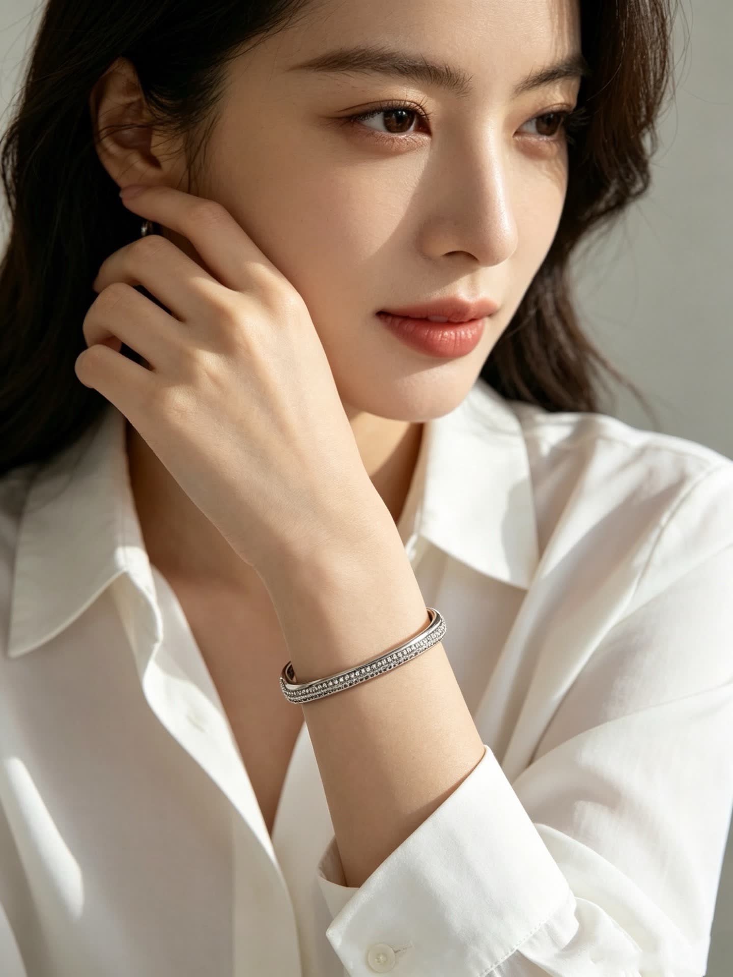 Cartier Elegant Silver Bangle Bracelet with Pave Setting