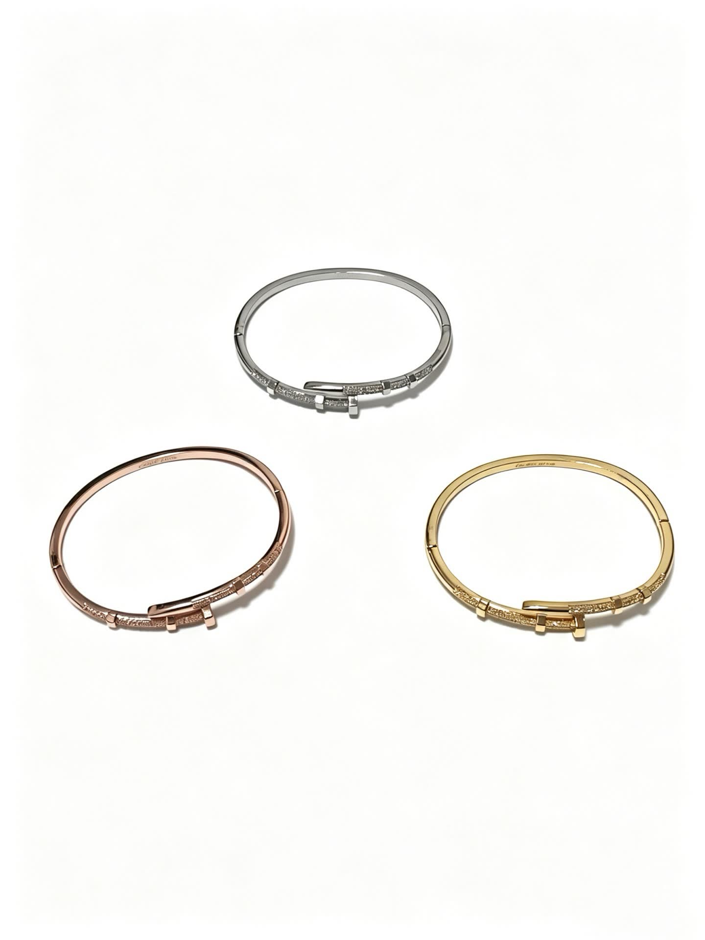 Cartier Elegant Silver Bangle Bracelet with Diamond Accents
