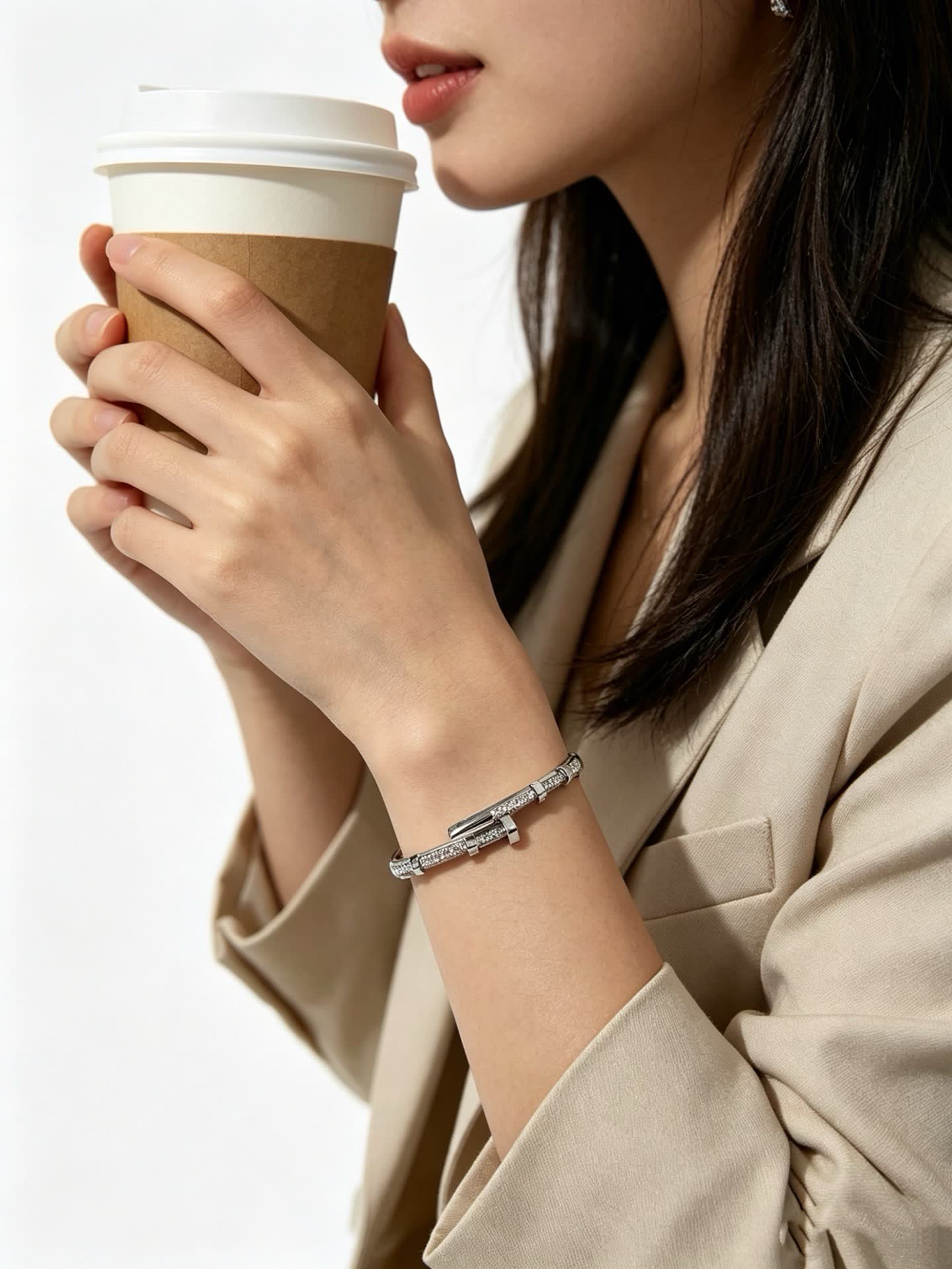 Cartier Elegant Silver Bangle Bracelet with Diamond Accents