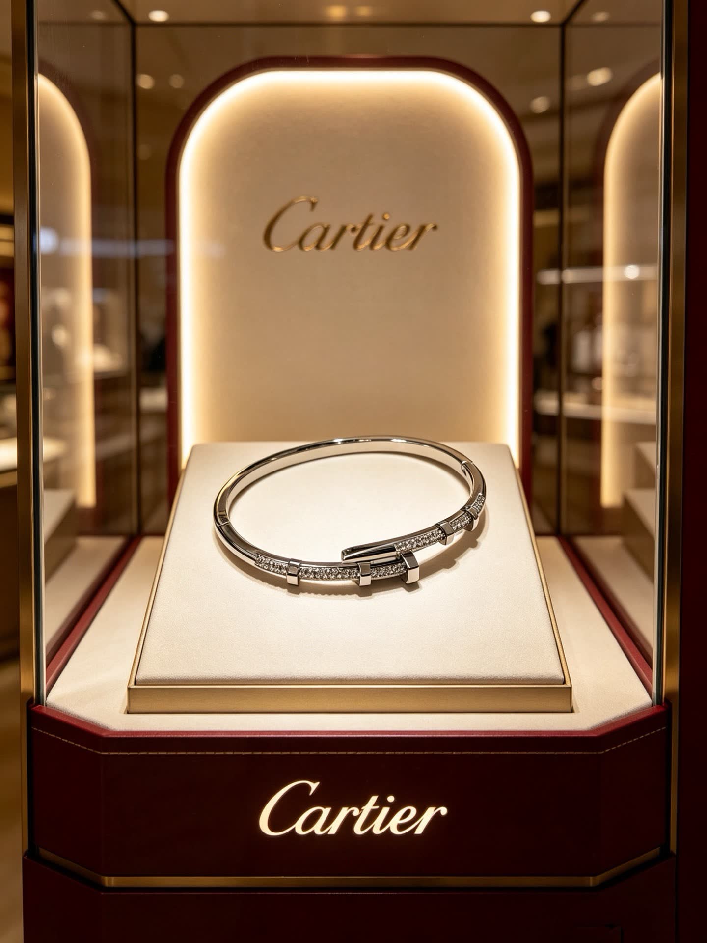 Cartier Elegant Silver Bangle Bracelet with Diamond Accents