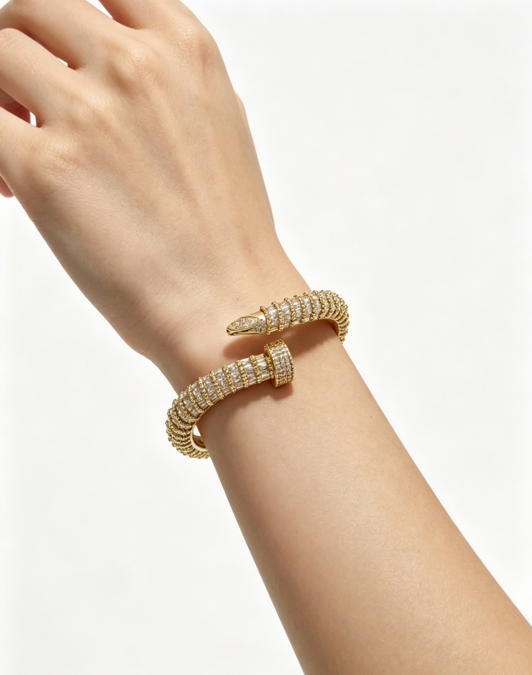 Cartier Elegant Gold and Diamond Bangle Bracelet