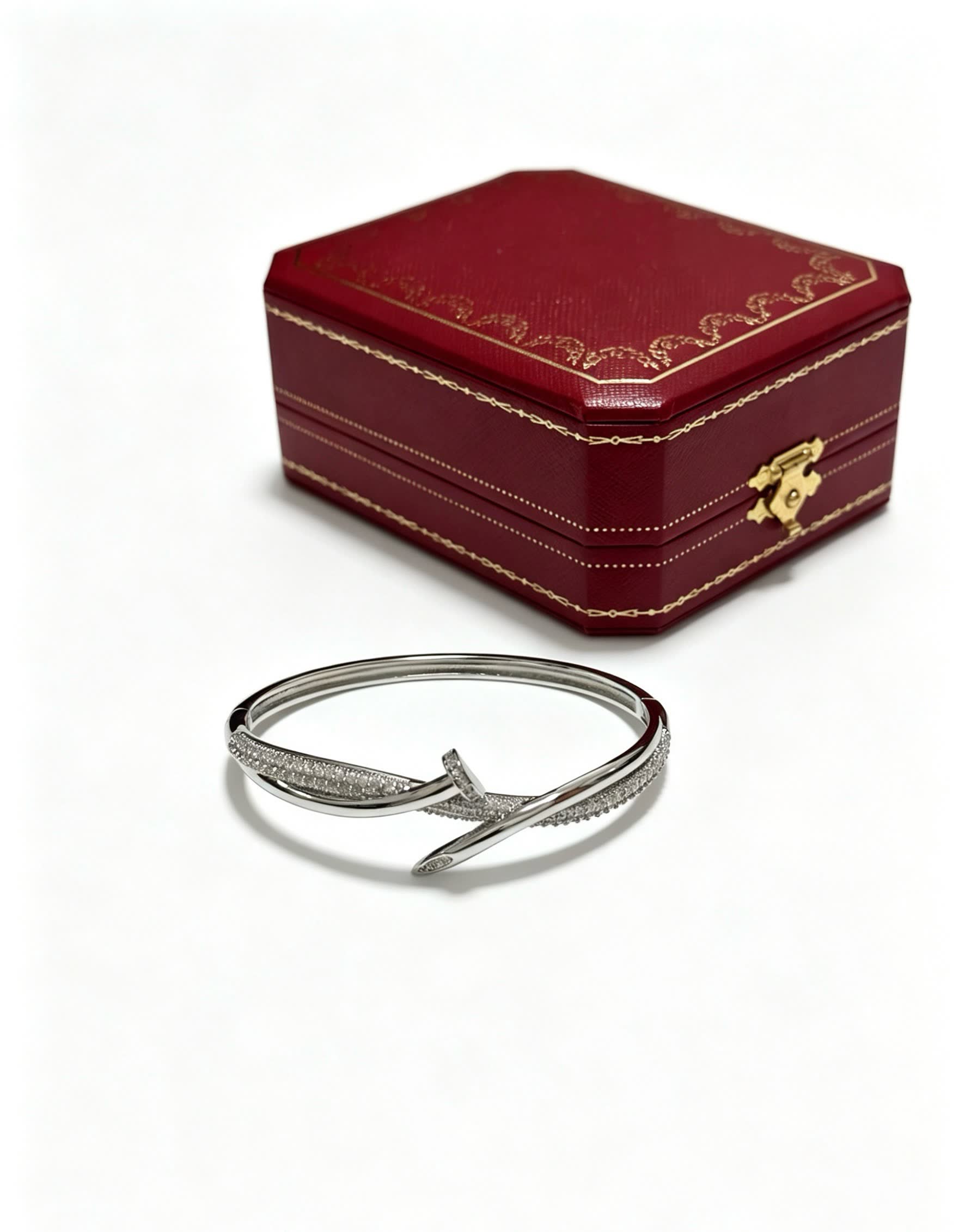Cartier Elegant Silver Bangle Bracelet with Diamond Accents Cartier Elegant Silver Bangle Bracelet with Diamond Accents