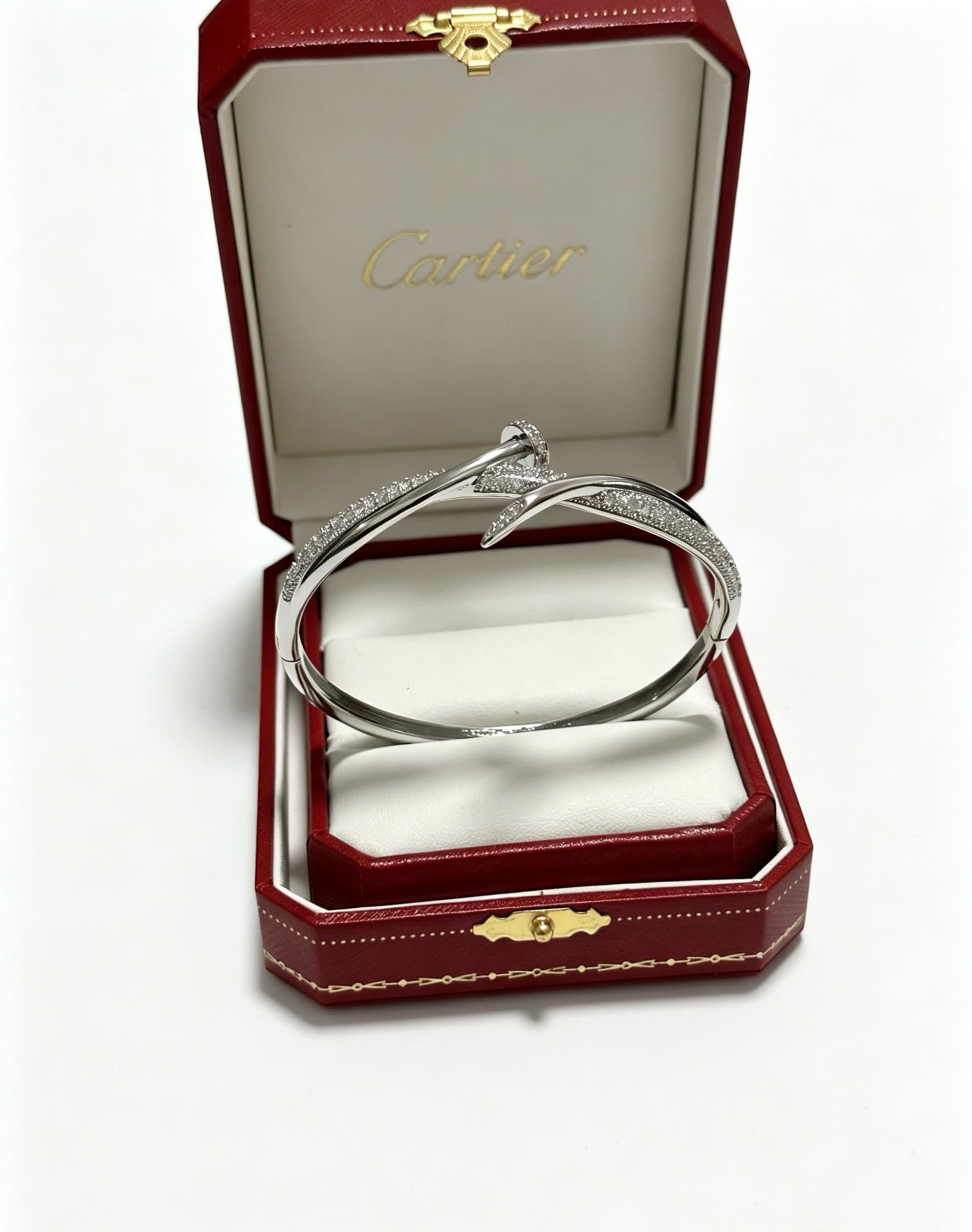 Cartier Elegant Silver Bangle Bracelet with Diamond Accents