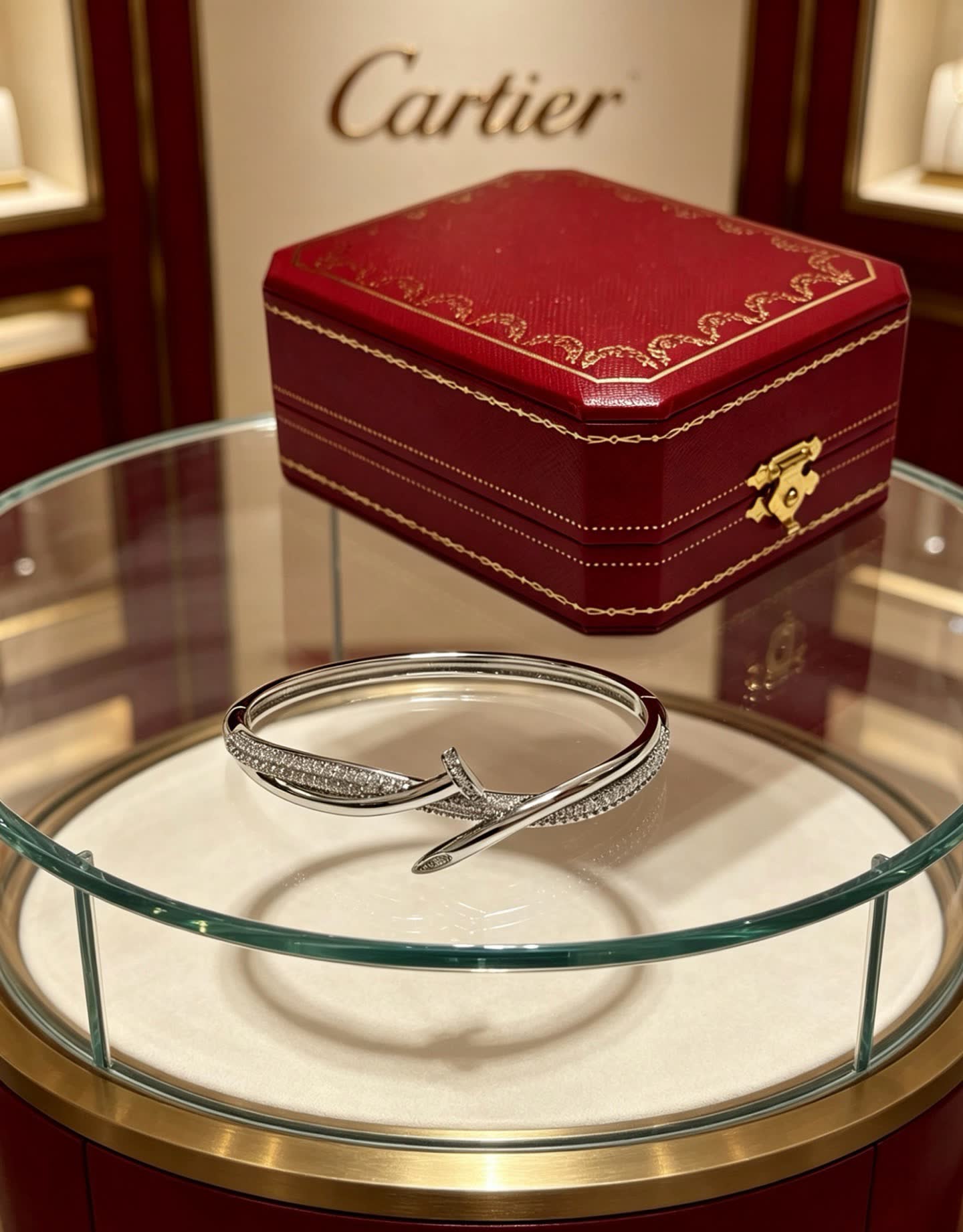 Cartier Elegant Silver Bangle Bracelet with Diamond Accents