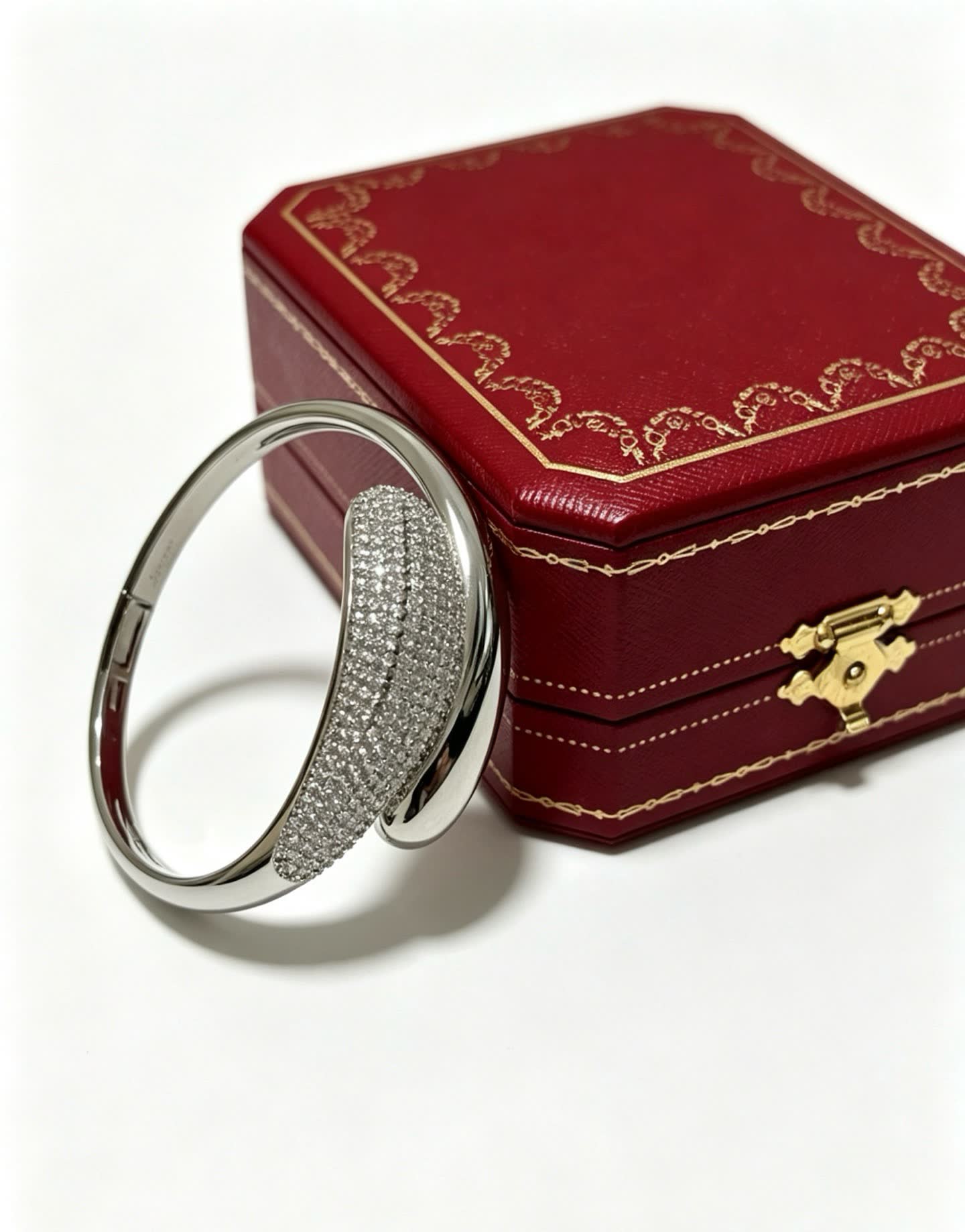 Cartier Elegant Silver Bangle Bracelet with Diamond Accents