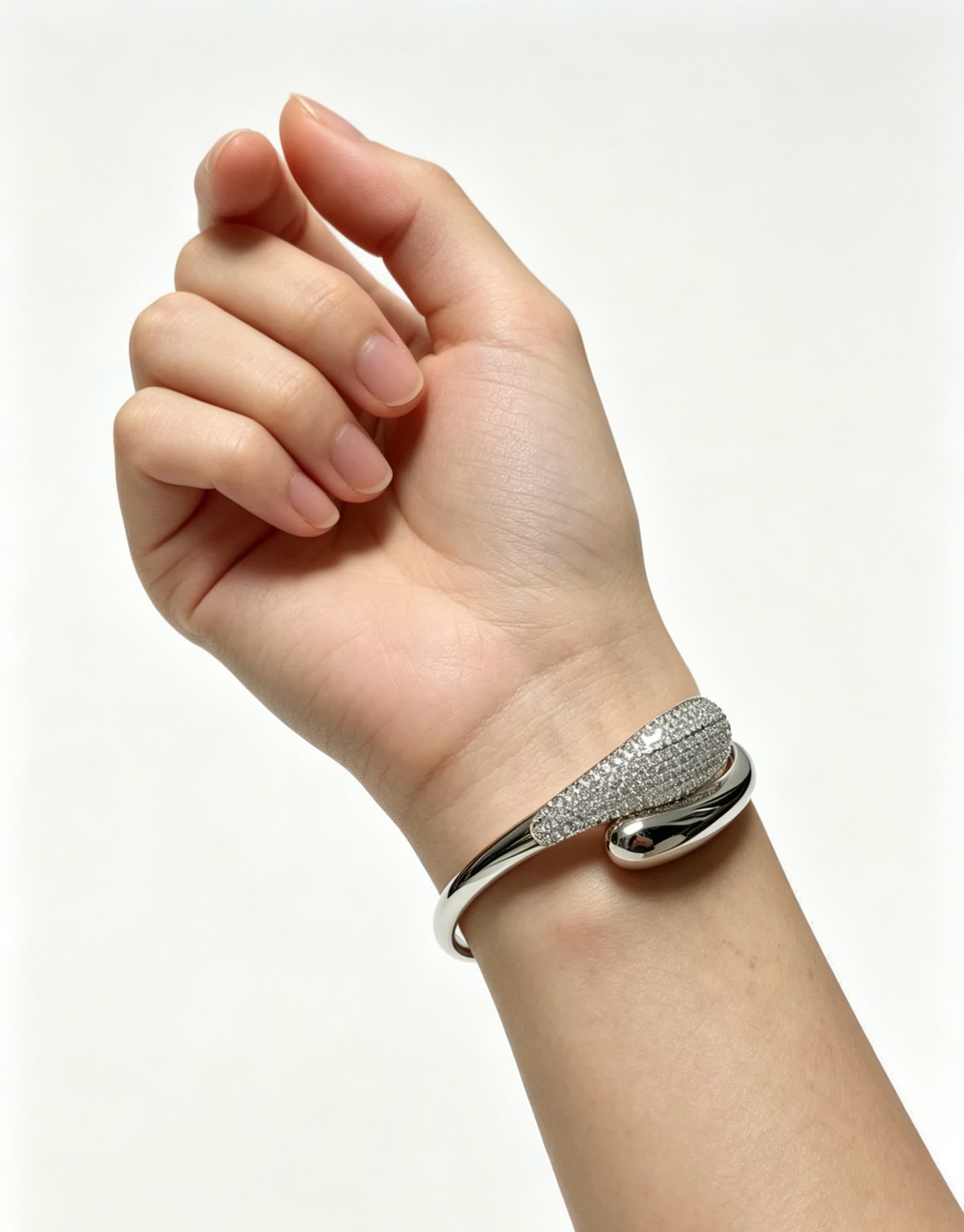 Cartier Elegant Silver Bangle Bracelet with Diamond Accents