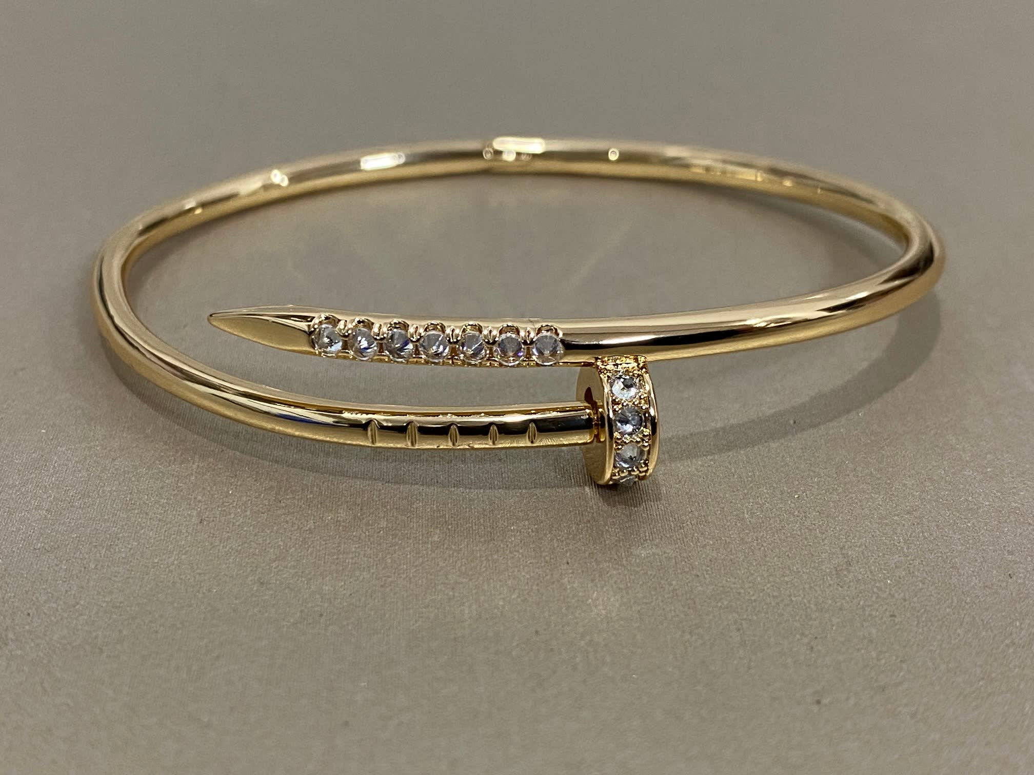 Cartier Elegant Gold and Silver Bangle Bracelets with Gemstones
