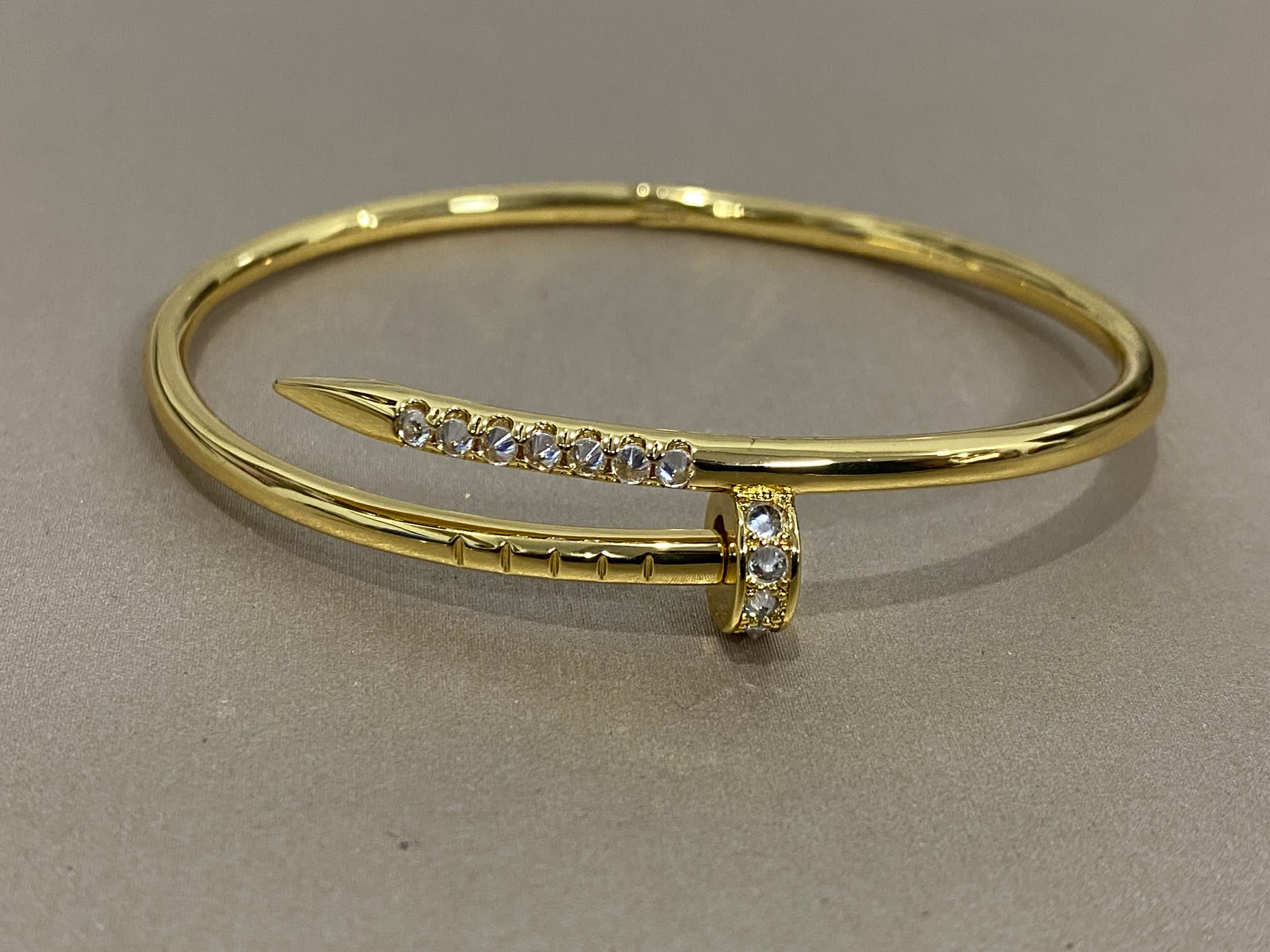 Cartier Elegant Gold and Silver Bangle Bracelets with Gemstones