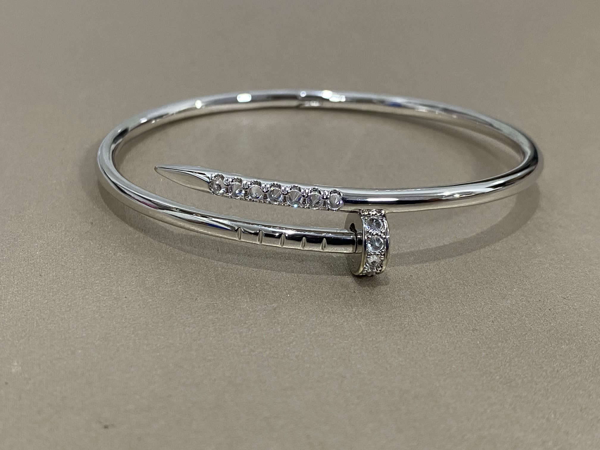 Cartier Elegant Gold and Silver Bangle Bracelets with Gemstones