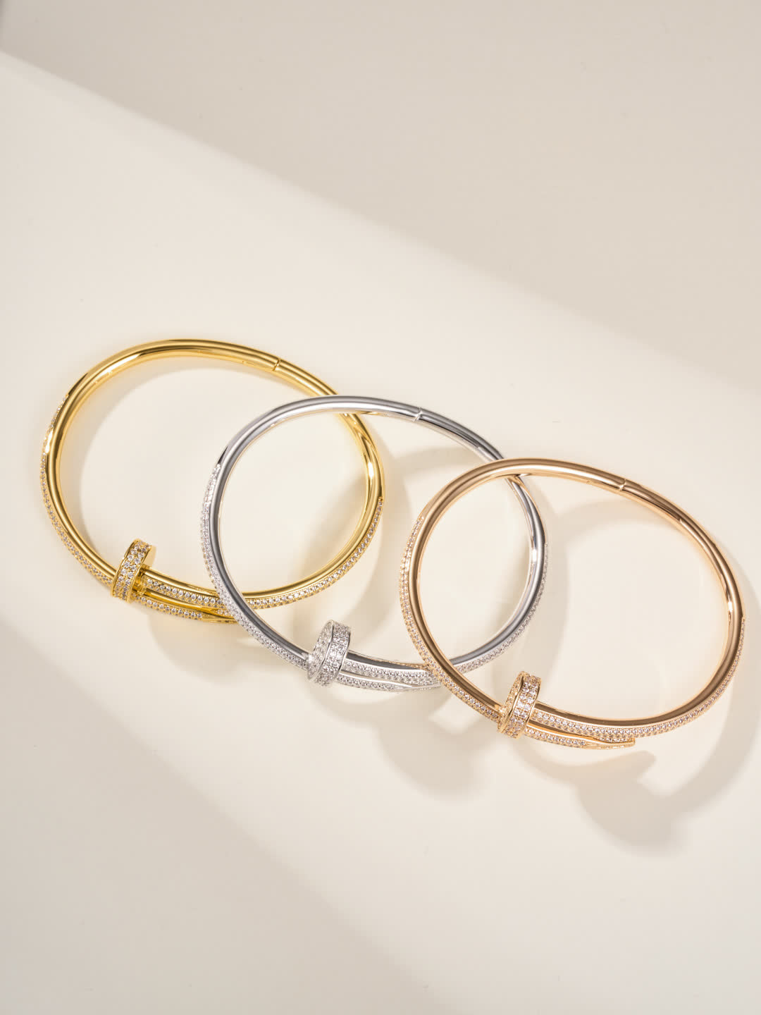 Cartier Elegant Gold and Silver Bangle Bracelets with Diamond Accents Cartier Elegant Gold and Silver Bangle Bracelets with Diamond Accents