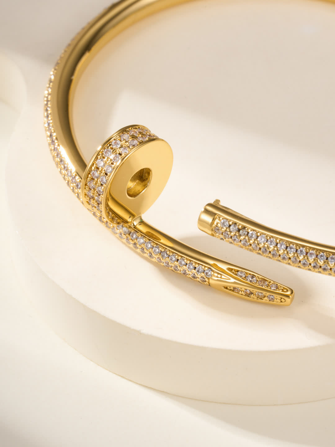 Cartier Elegant Gold and Silver Bangle Bracelets with Diamond Accents