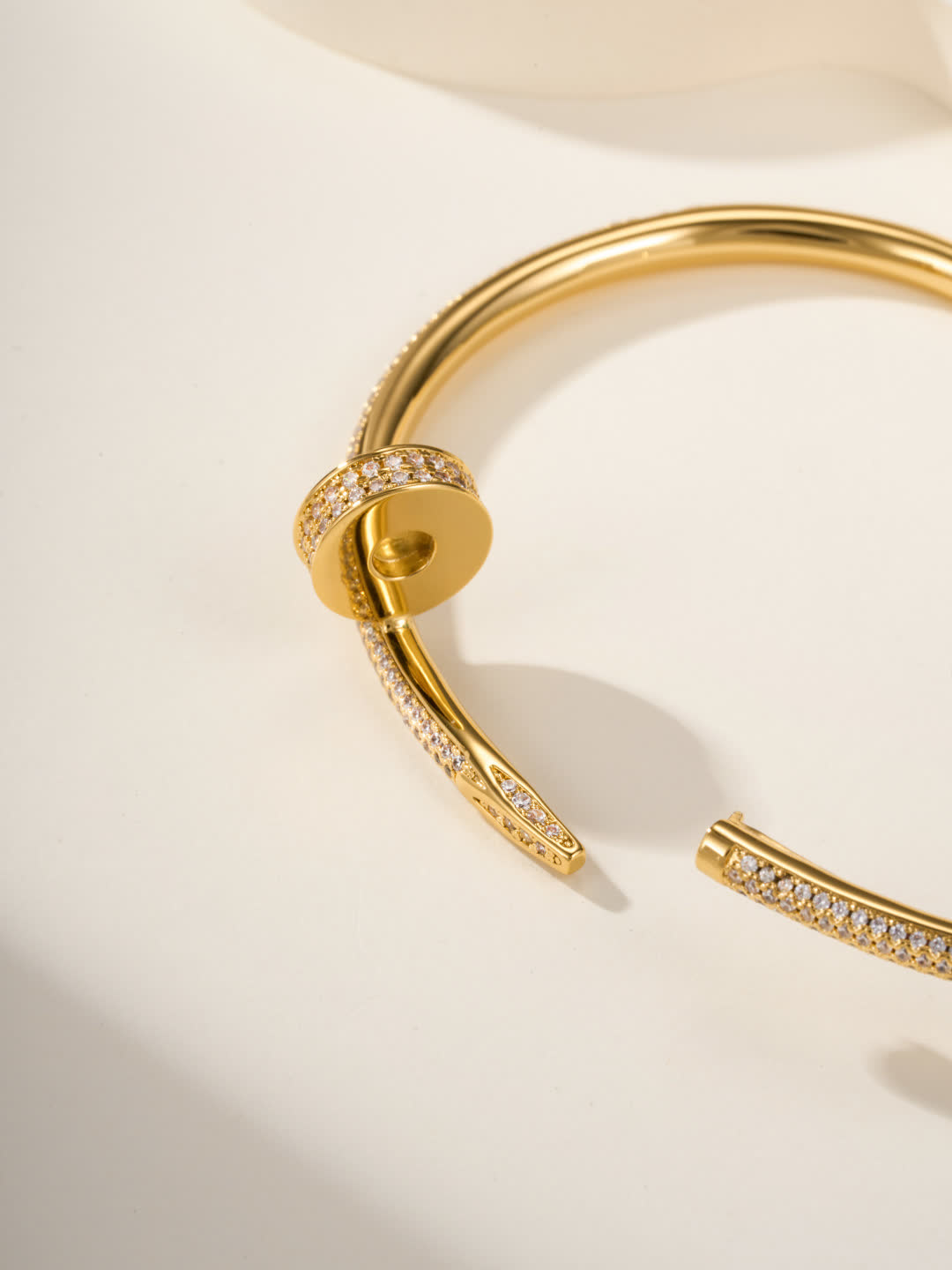 Cartier Elegant Gold and Silver Bangle Bracelets with Diamond Accents