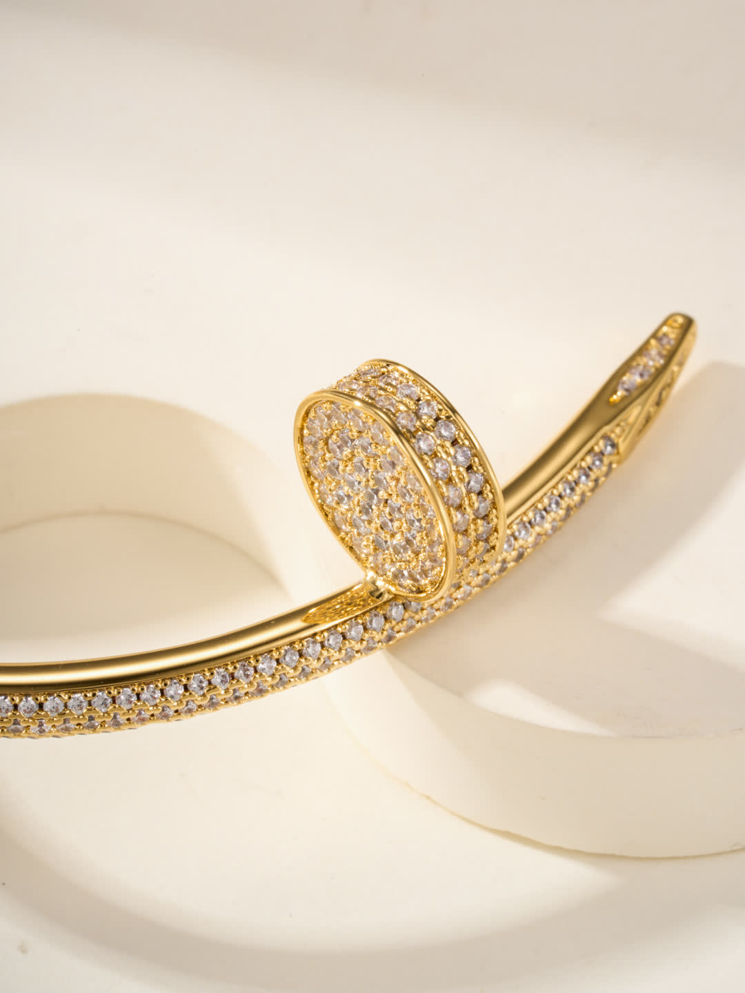 Cartier Elegant Gold and Silver Bangle Bracelets with Diamond Accents