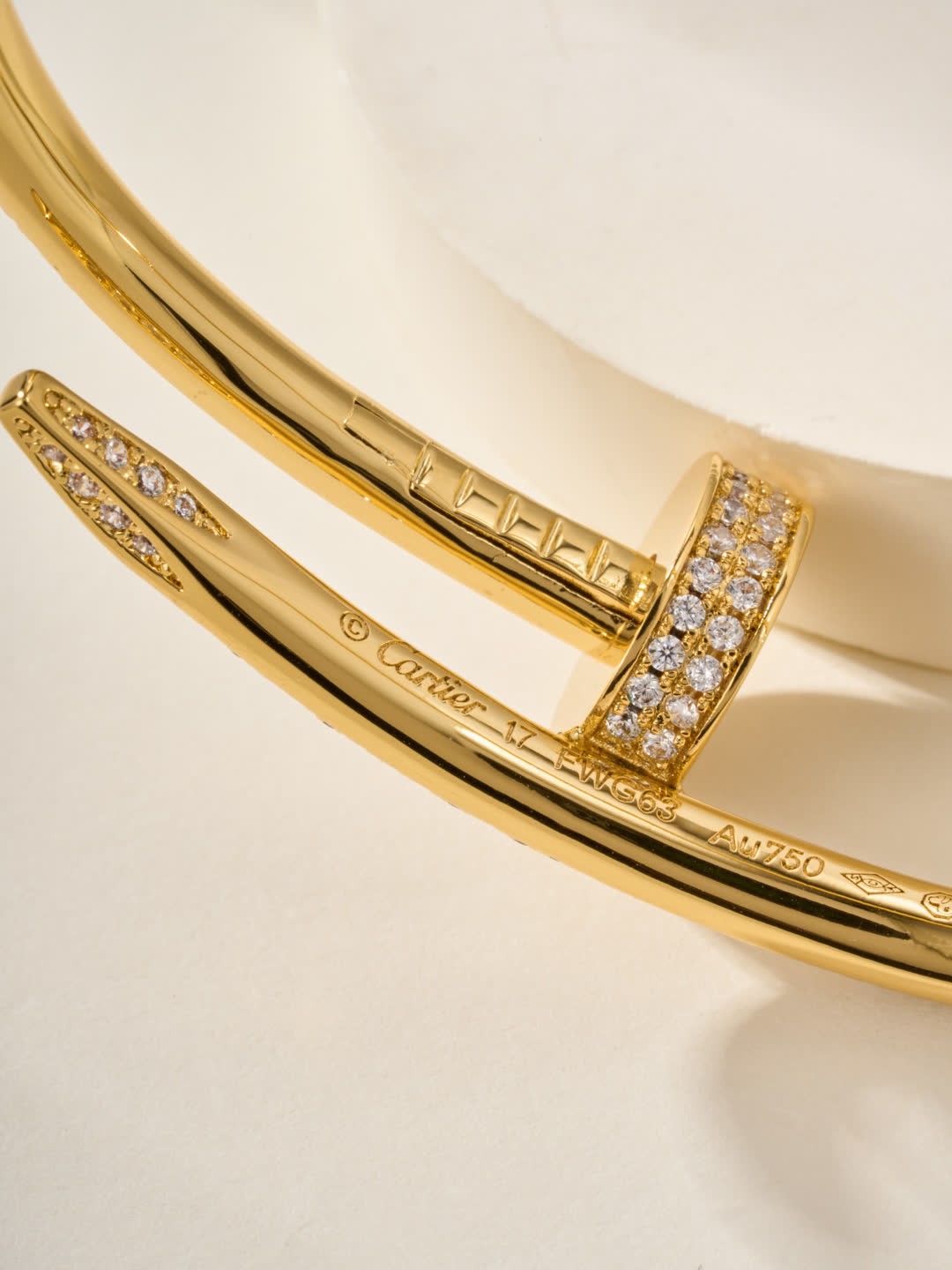 Cartier Elegant Gold and Silver Bangle Bracelets with Diamond Accents