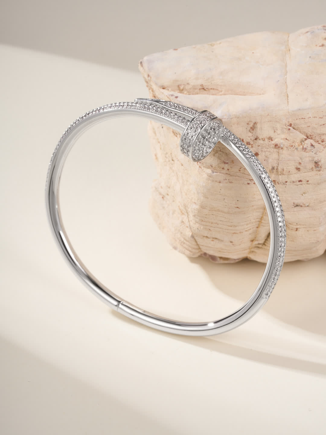 Cartier Elegant Gold and Silver Bangle Bracelets with Diamond Accents