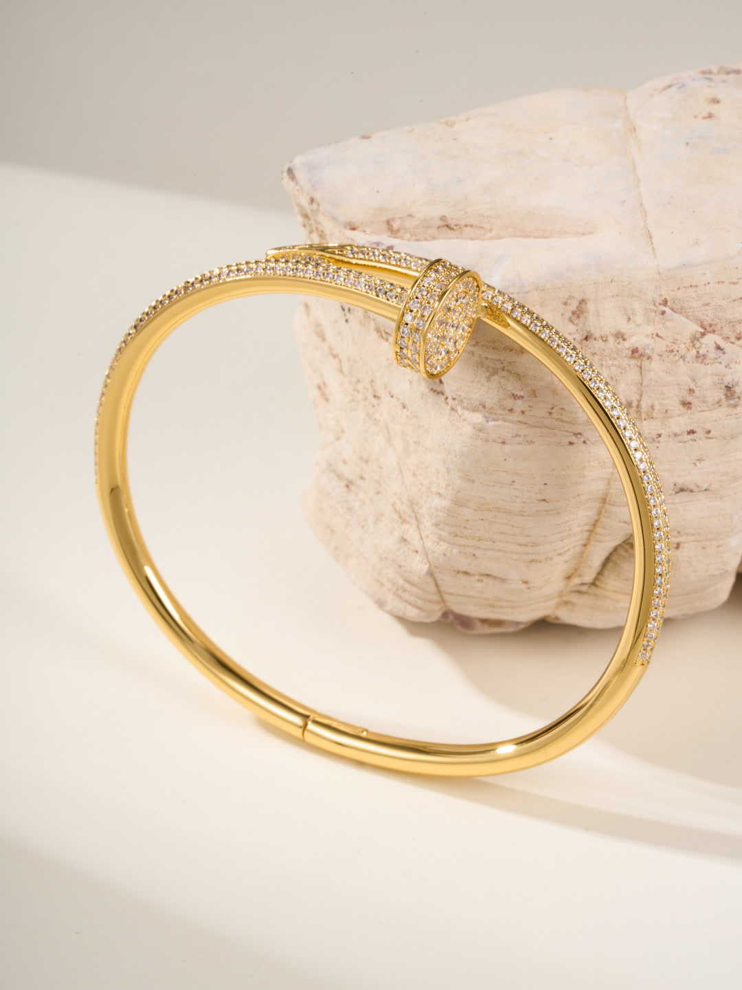 Cartier Elegant Gold and Silver Bangle Bracelets with Diamond Accents