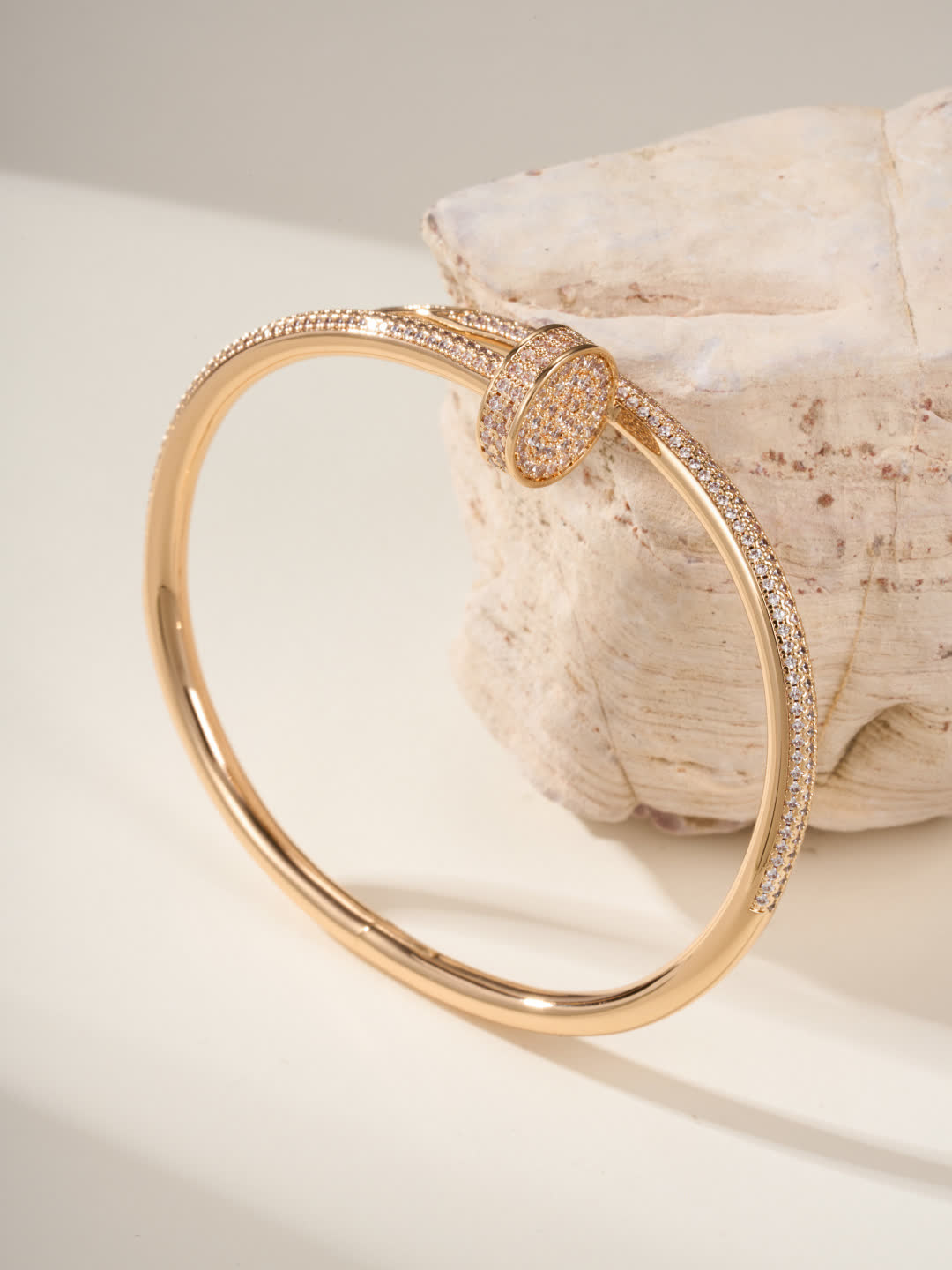 Cartier Elegant Gold and Silver Bangle Bracelets with Diamond Accents