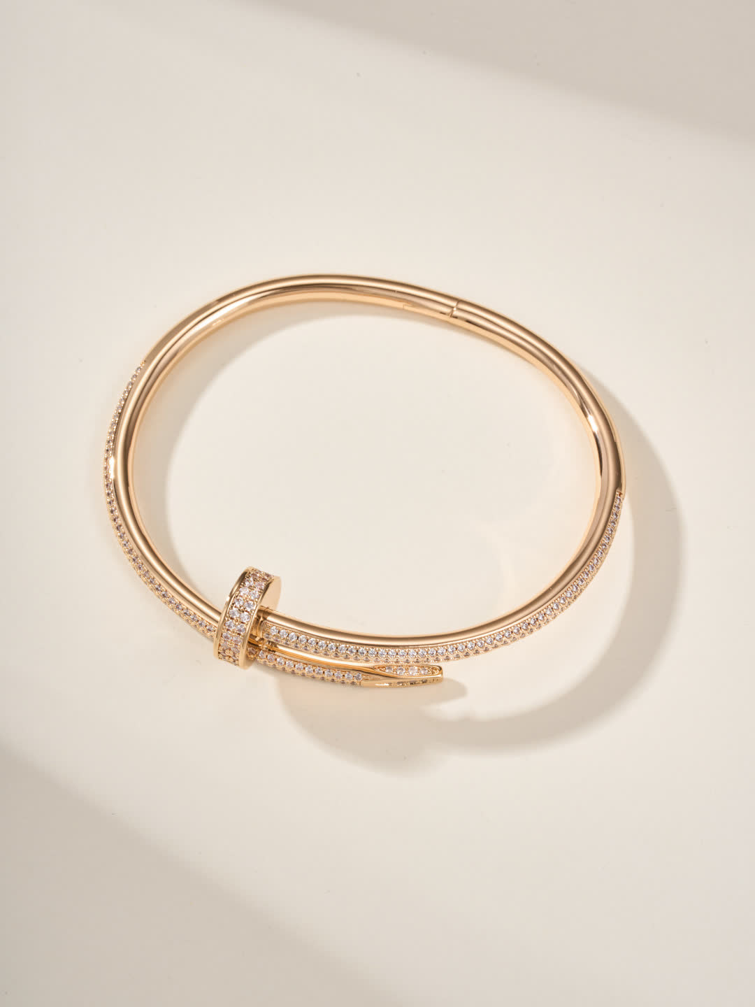 Cartier Elegant Gold and Silver Bangle Bracelets with Diamond Accents