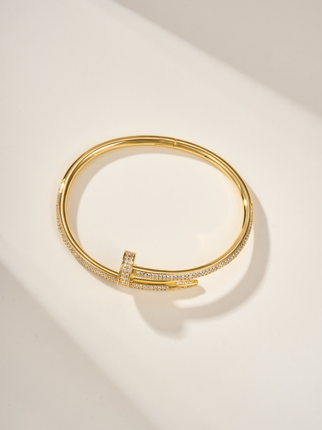 Cartier Elegant Gold and Silver Bangle Bracelets with Diamond Accents