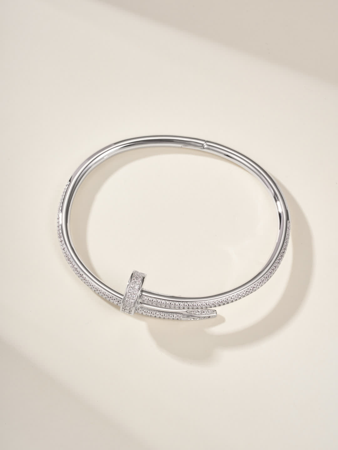 Cartier Elegant Gold and Silver Bangle Bracelets with Diamond Accents