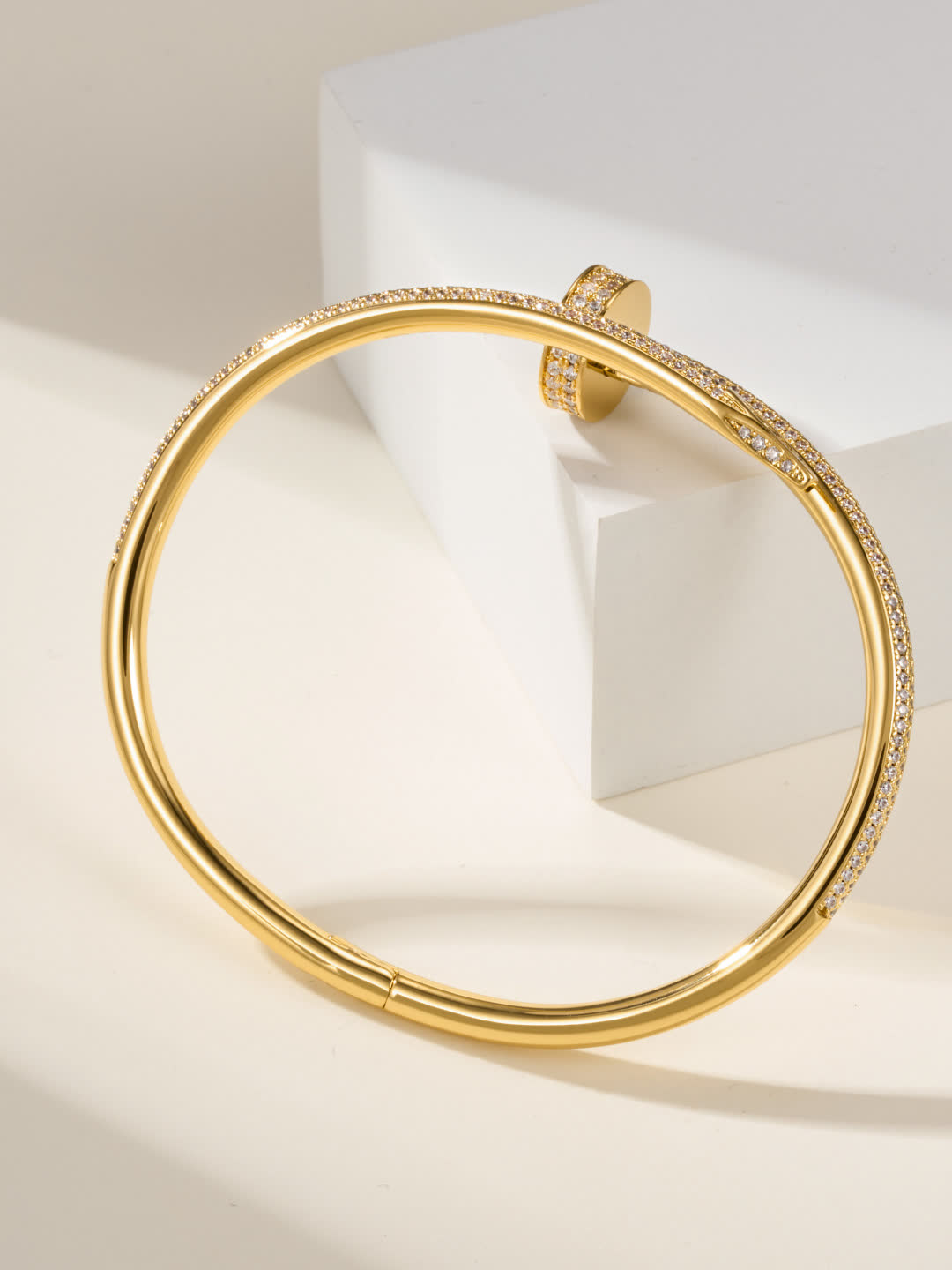 Cartier Elegant Gold and Silver Bangle Bracelets with Diamond Accents