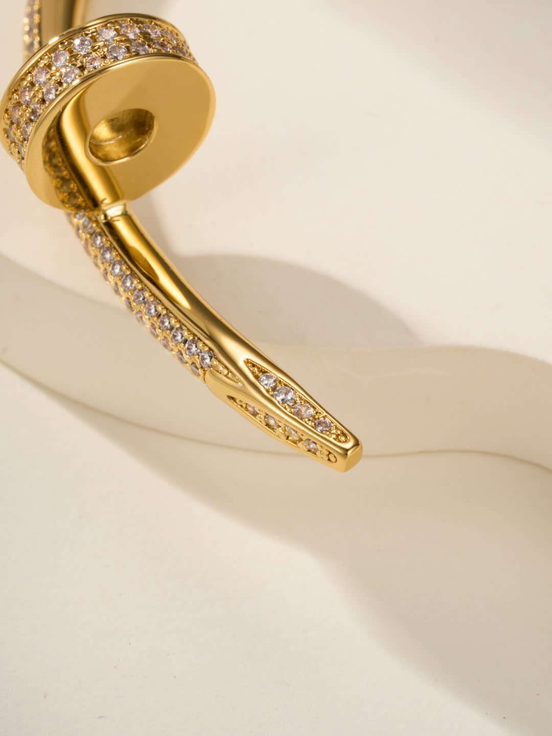 Cartier Elegant Gold and Silver Bangle Bracelets with Diamond Accents