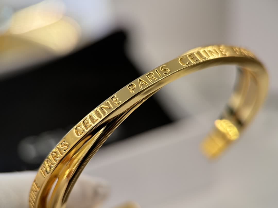 Celine Paris Gold Tone Bangle Bracelet