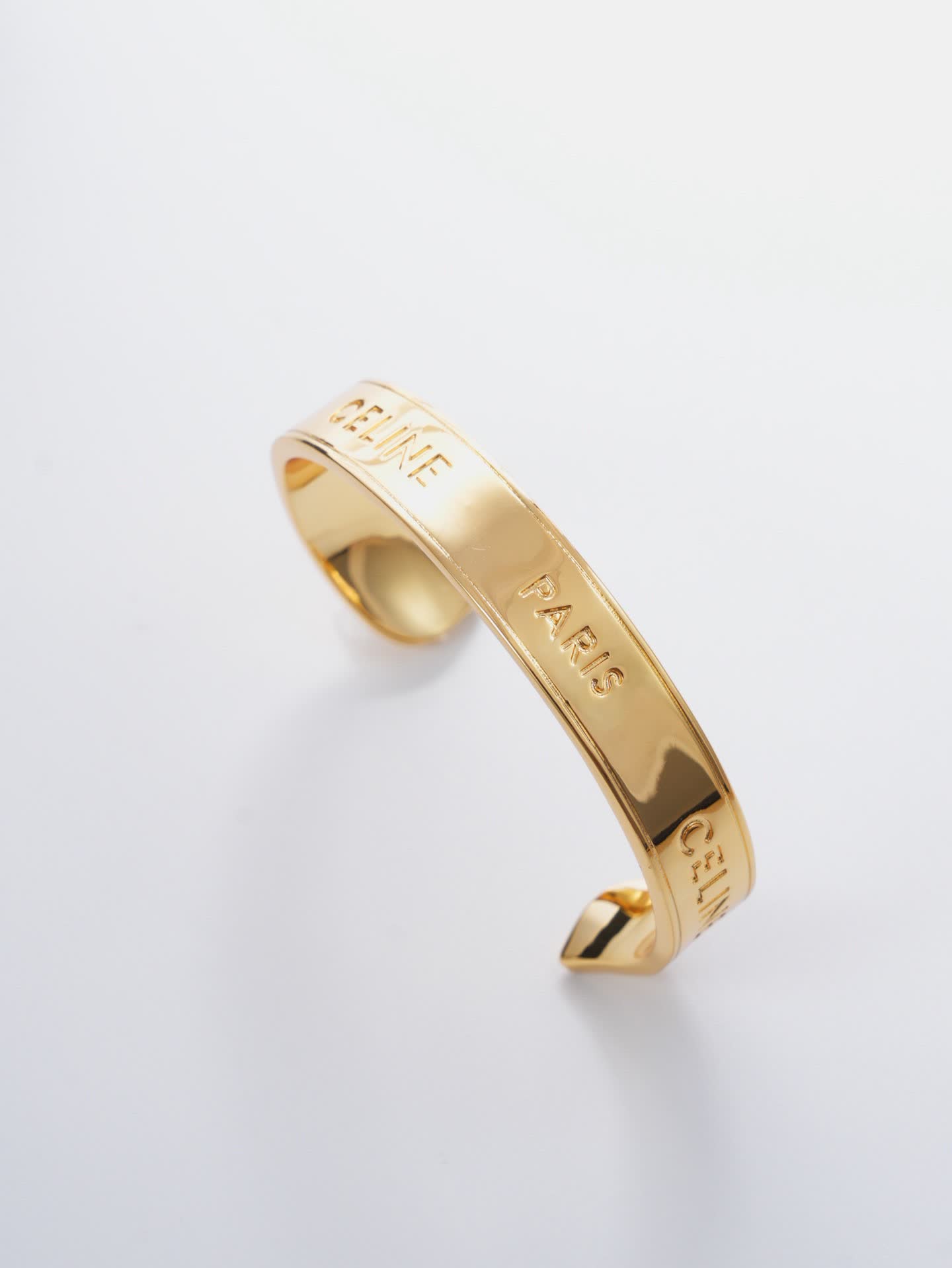 Celine Paris Gold Tone Cuff Bracelet