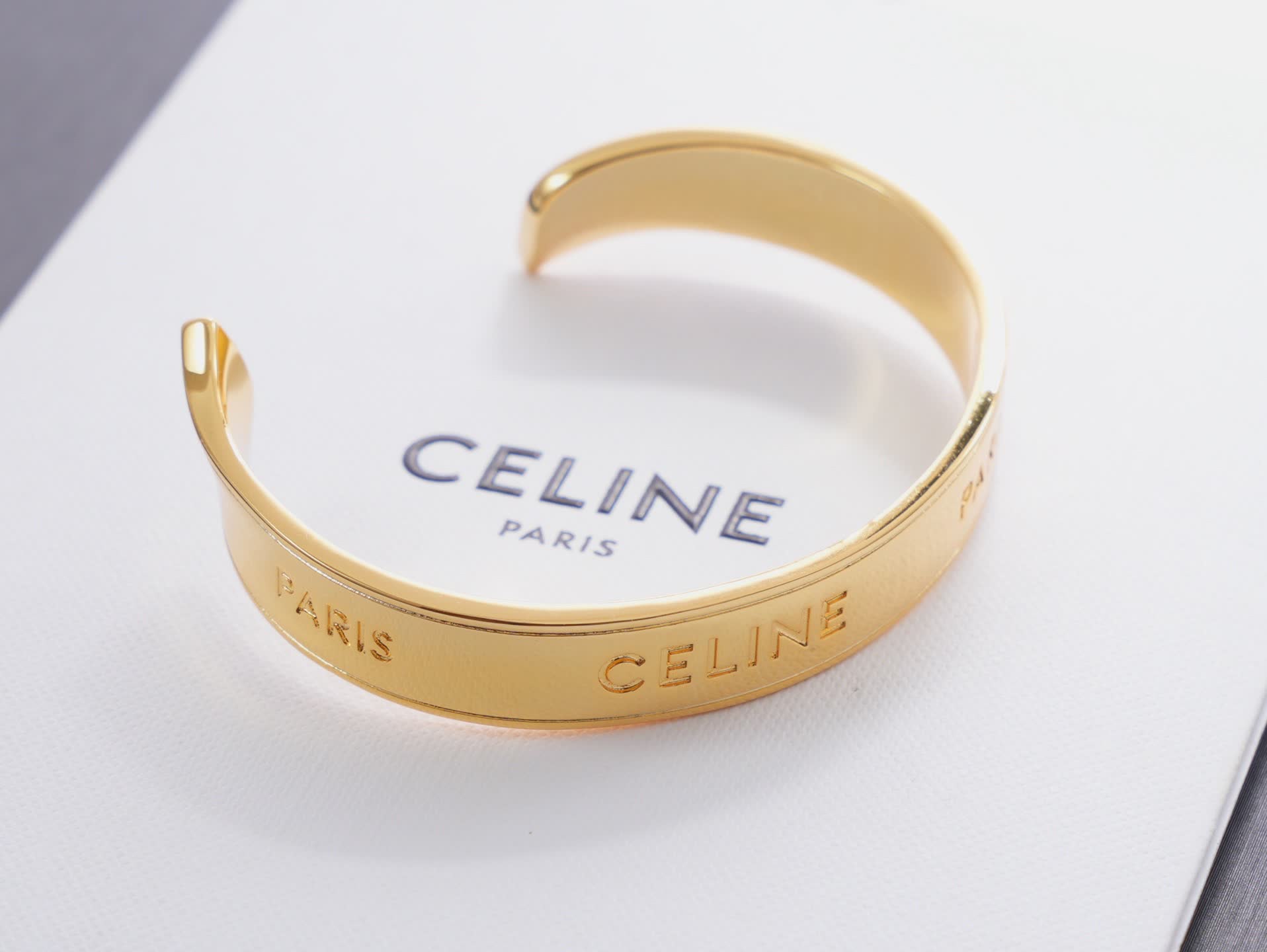 Celine Paris Gold Tone Cuff Bracelet