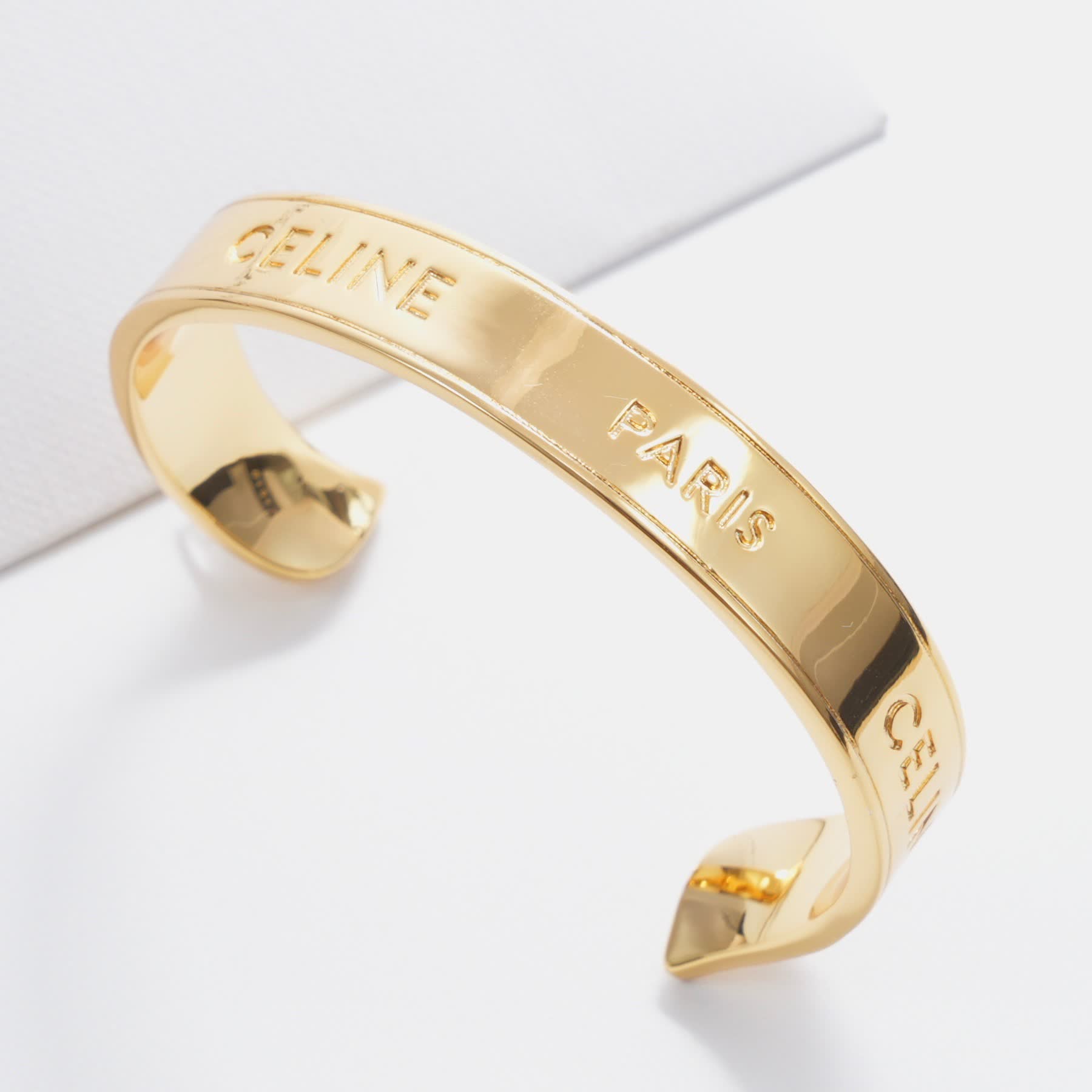 Celine Paris Gold Tone Cuff Bracelet