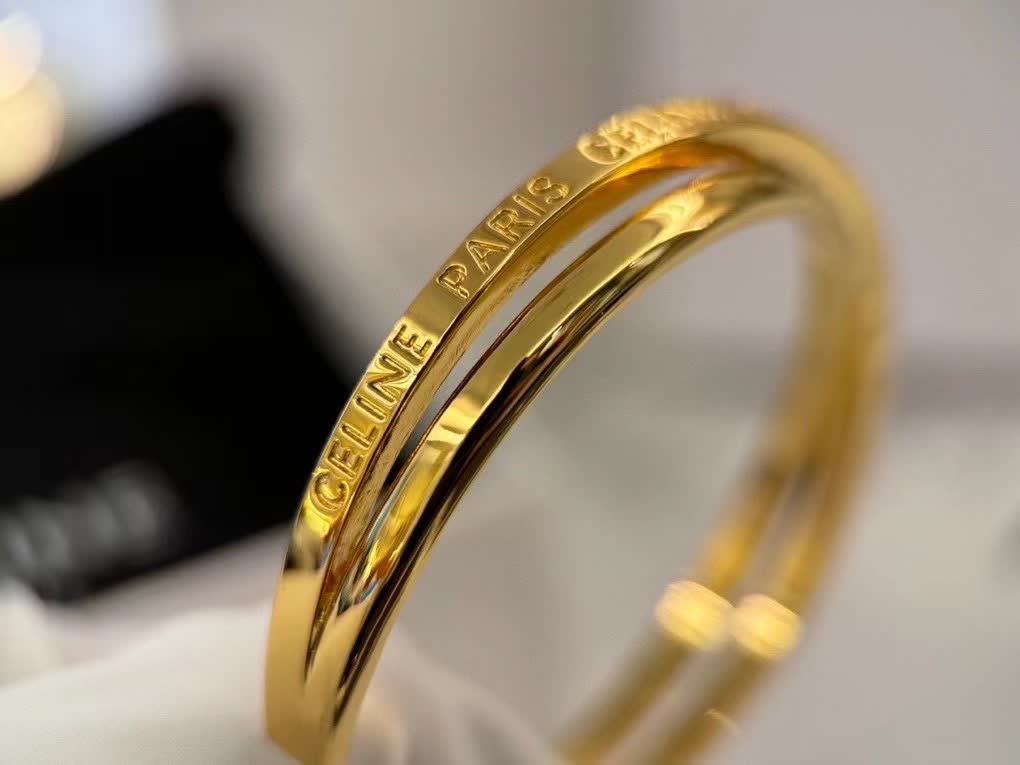 Celine Paris Engraved Gold Bracelet