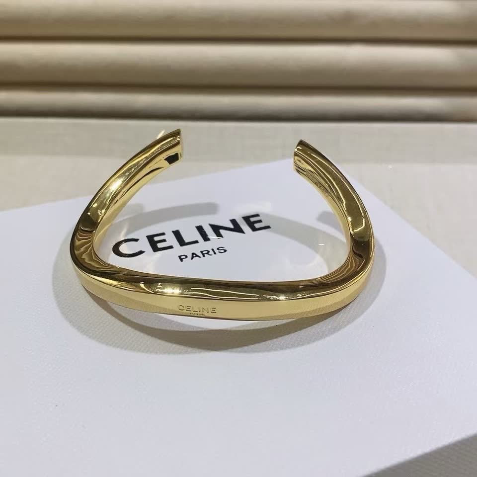 Celine Paris Gold Tone Bangle Bracelet