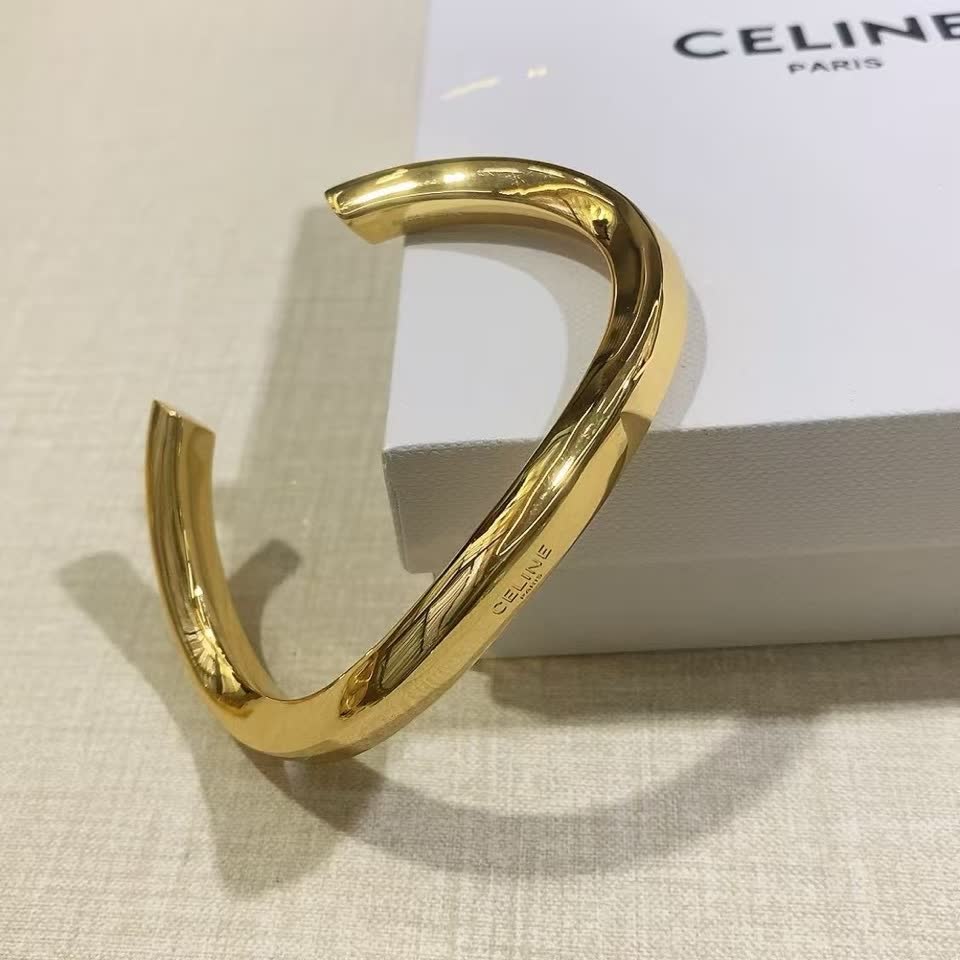 Celine Paris Gold Tone Bangle Bracelet