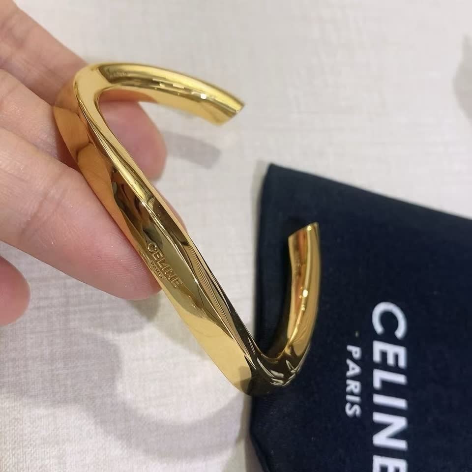 Celine Paris Gold Tone Bangle Bracelet