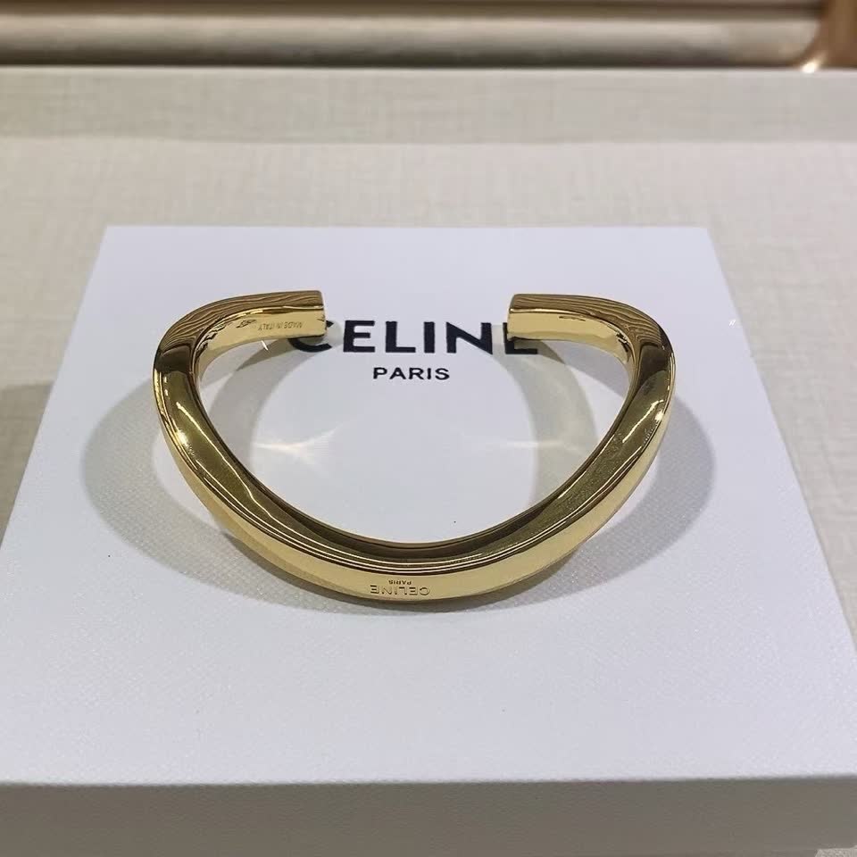 Celine Paris Gold Tone Bangle Bracelet