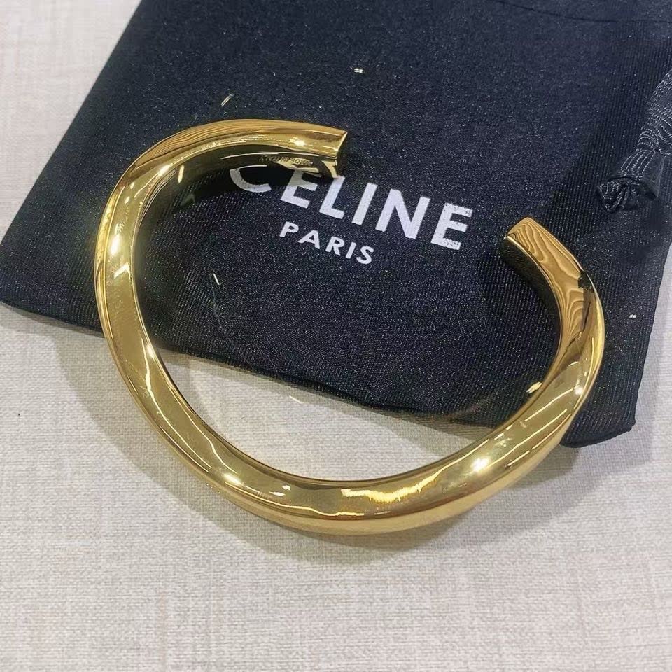 Celine Paris Gold Tone Bangle Bracelet