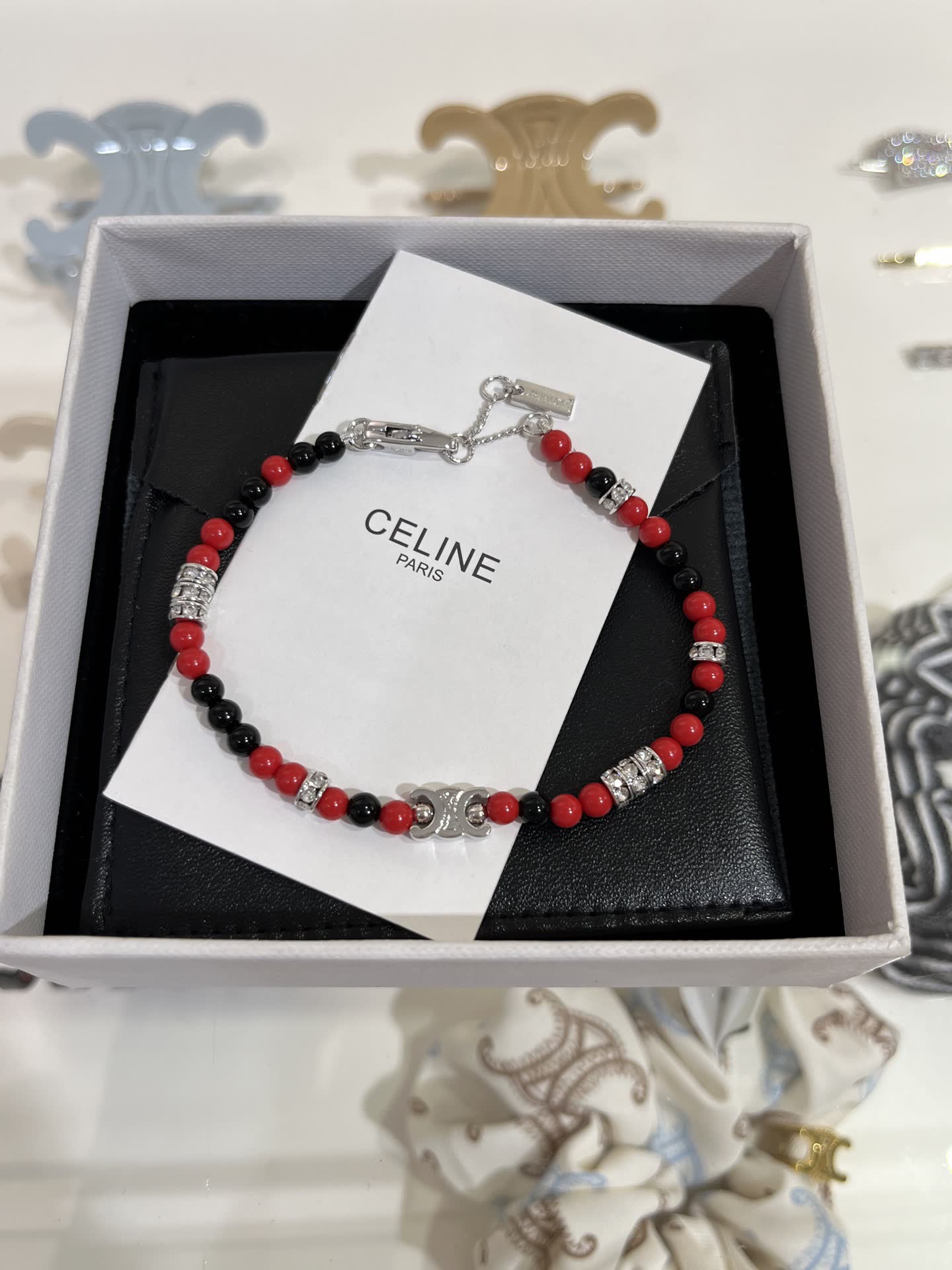 Celine Red Beaded Bracelet with Silver Charm