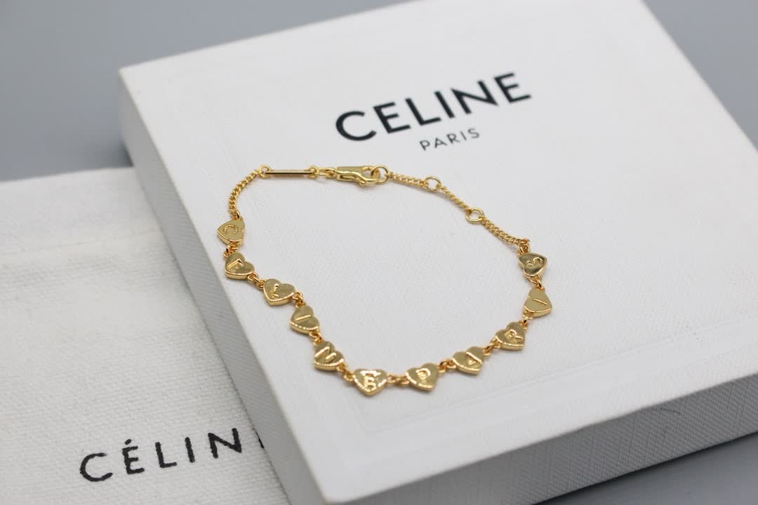 Celine Paris Gold Tone Heart Bracelet