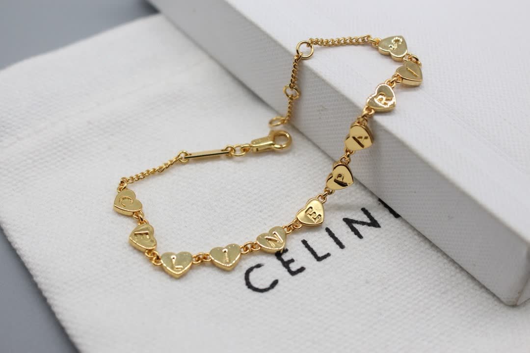 Celine Paris Gold Tone Heart Bracelet