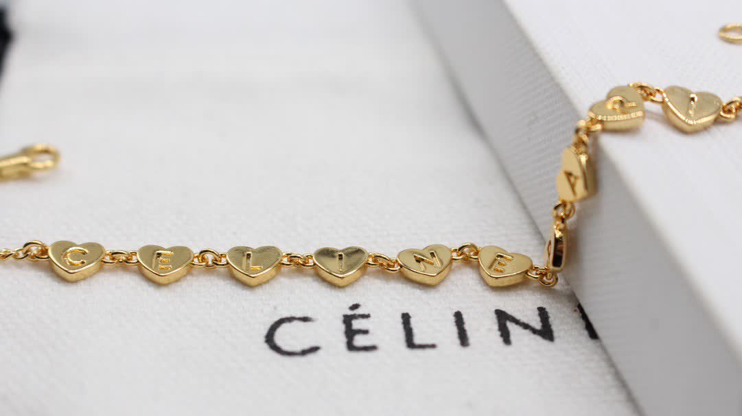 Celine Paris Gold Tone Heart Bracelet