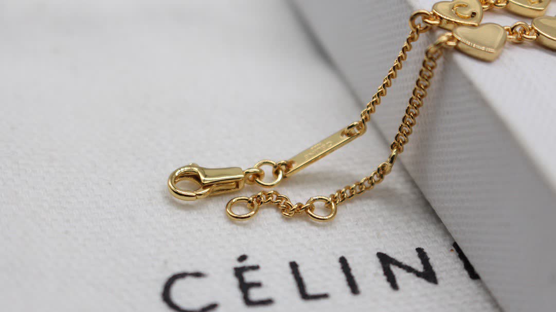 Celine Paris Gold Tone Heart Bracelet