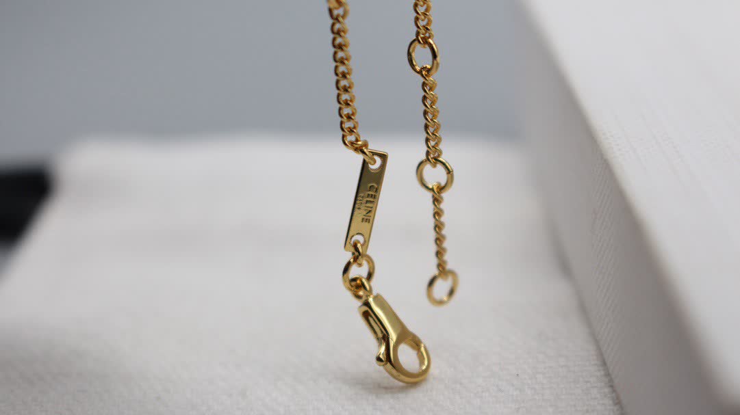 Celine Paris Gold Tone Heart Bracelet