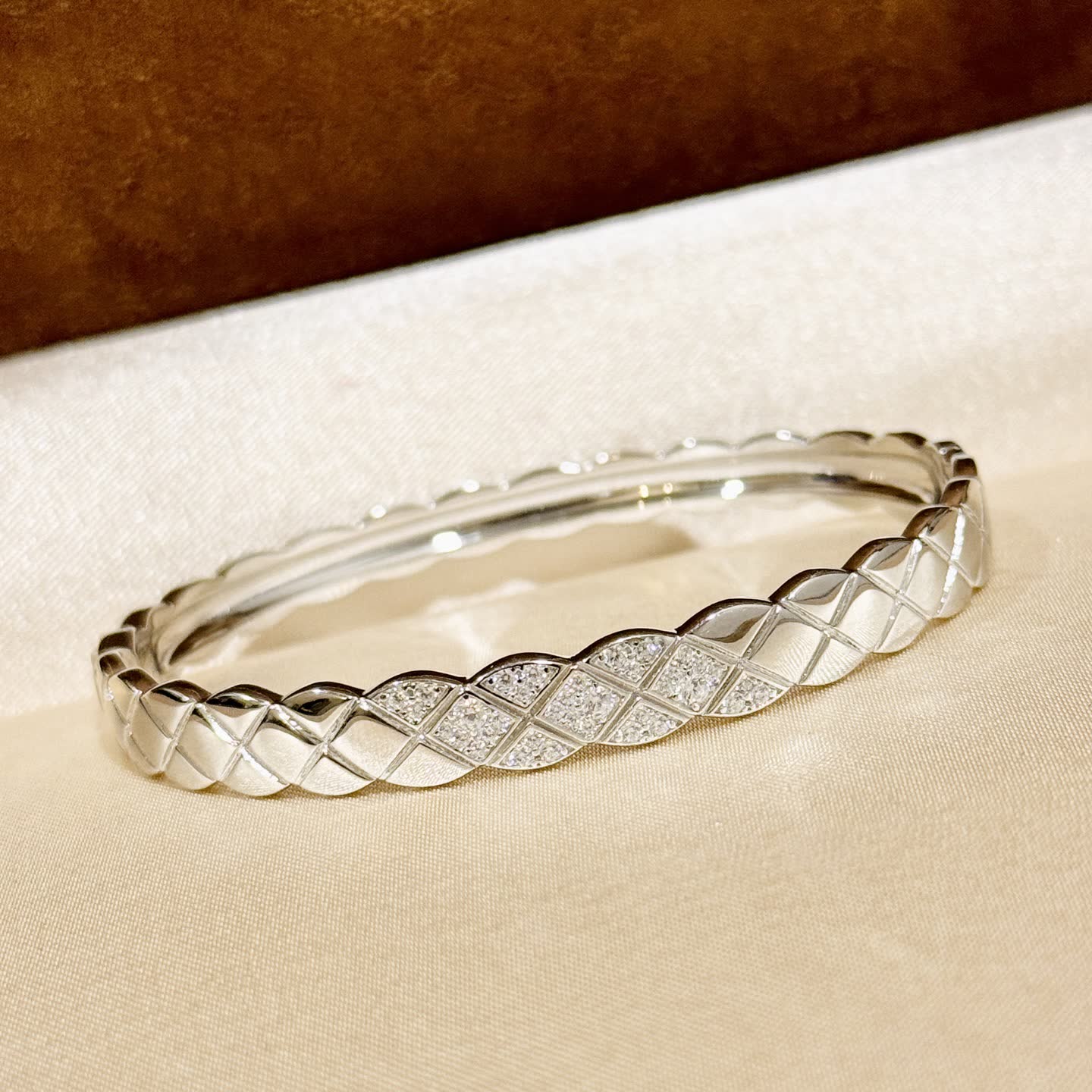 Elegant Silver Bangle Bracelet with Diamond Accents Elegant Silver Bangle Bracelet with Diamond Accents