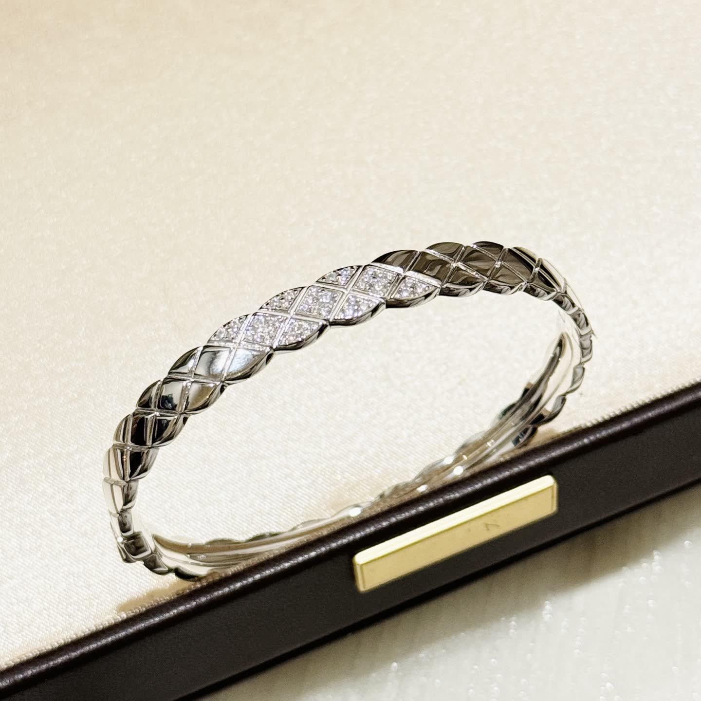 Elegant Silver Bangle Bracelet with Diamond Accents Elegant Silver Bangle Bracelet with Diamond Accents