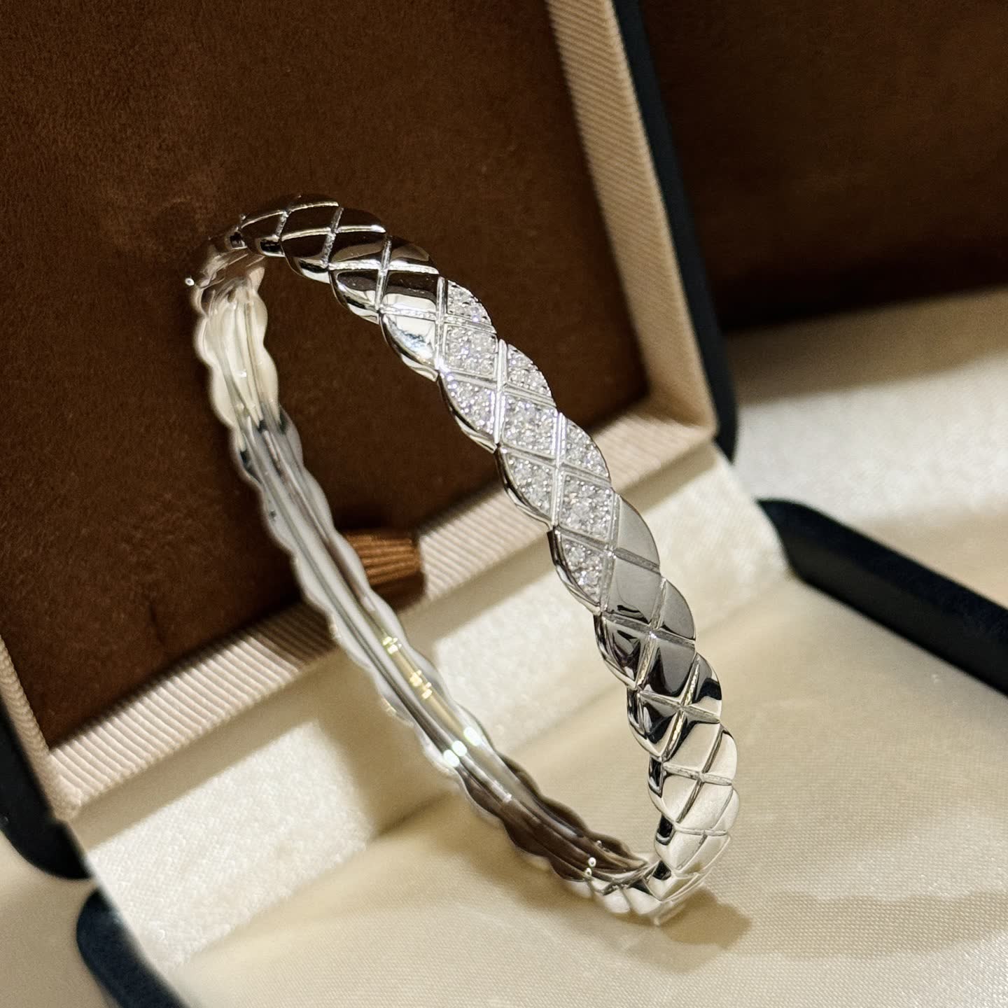 Elegant Silver Bangle Bracelet with Diamond Accents Elegant Silver Bangle Bracelet with Diamond Accents
