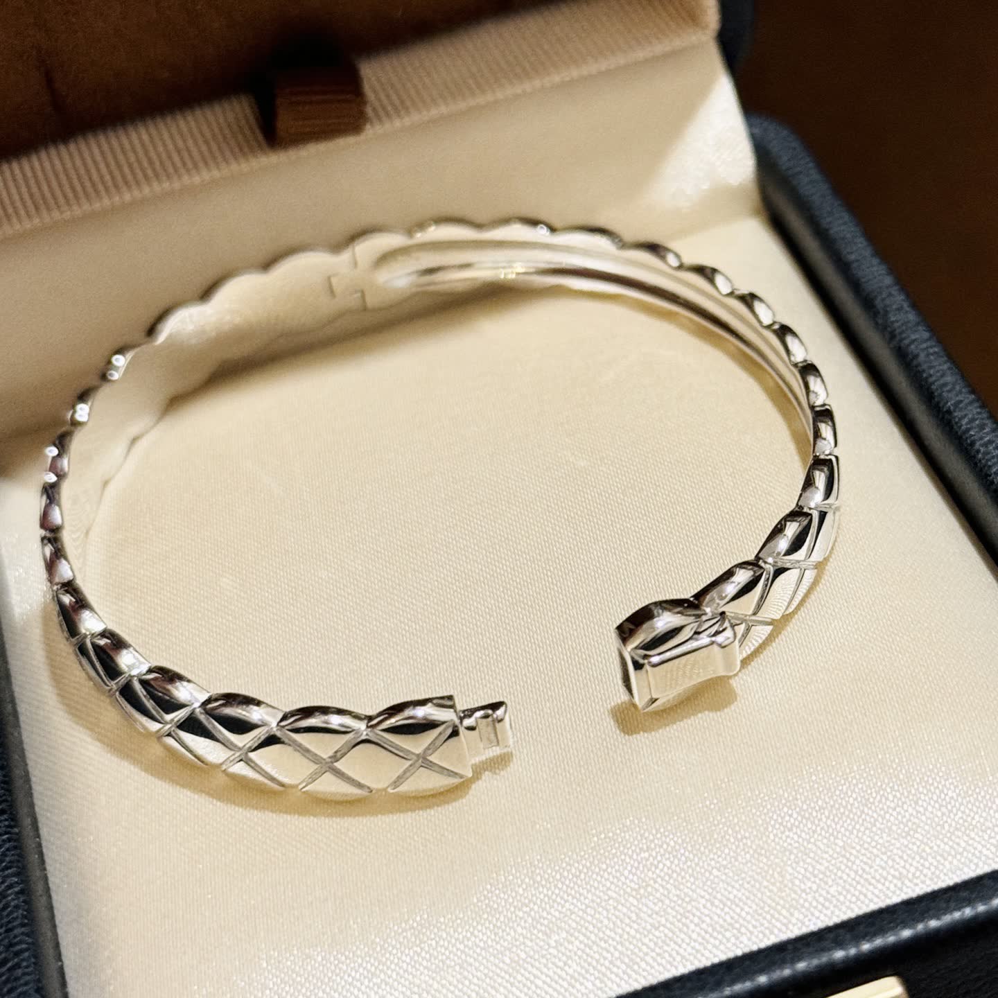 Elegant Silver Bangle Bracelet with Diamond Accents Elegant Silver Bangle Bracelet with Diamond Accents